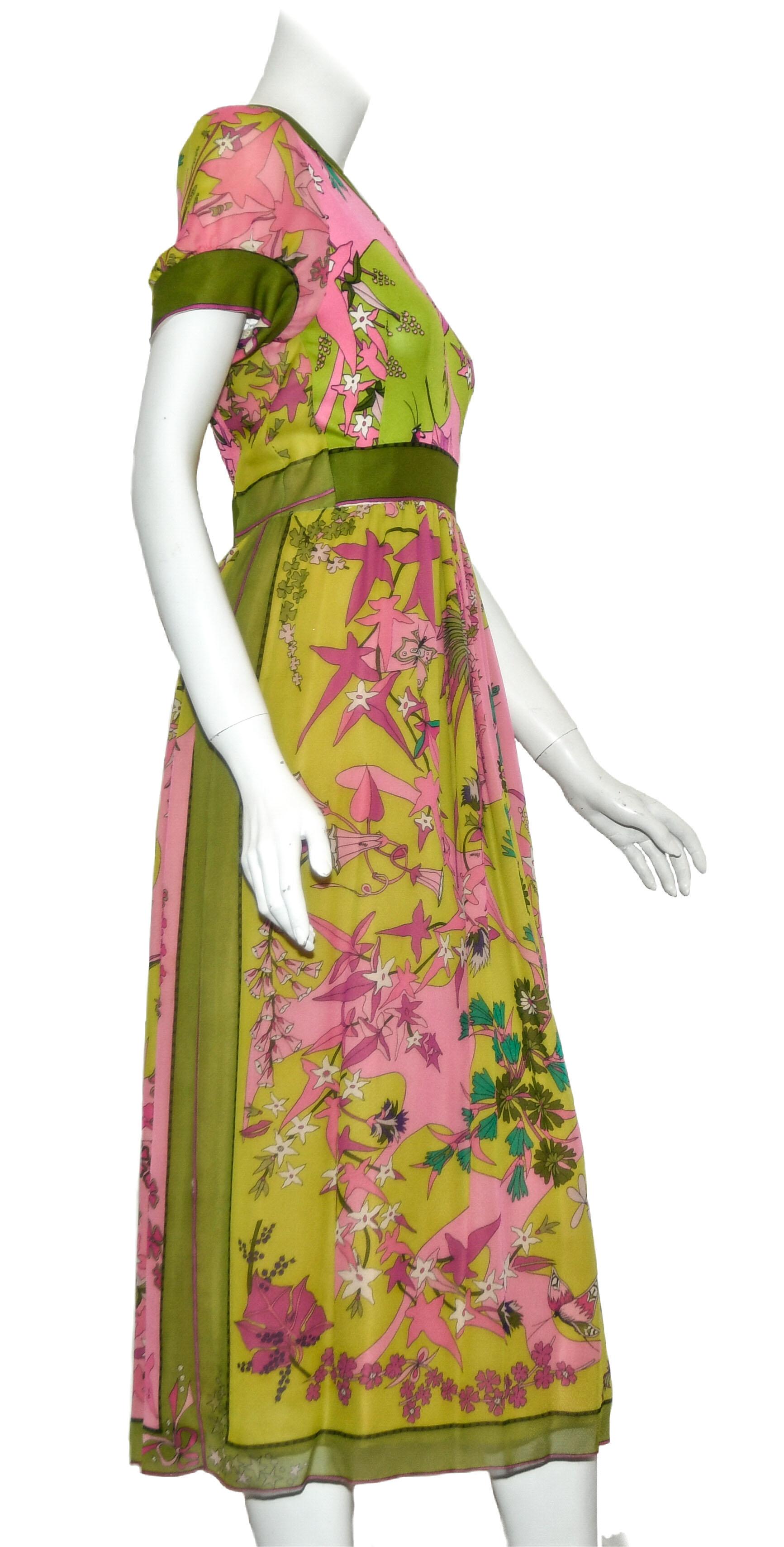 Hutzlers multi color silk vintage dress from the 1960's.  This dress from Hutzlers of Baltimore was made specially for this store in Italy.  This dress is fully lined in green crepe de chine.   For closure a zipper at the back.    It is in good