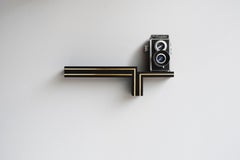 "Elevate No. 2" brass and burnt wood, floating wall shelf, artist-made sculpture