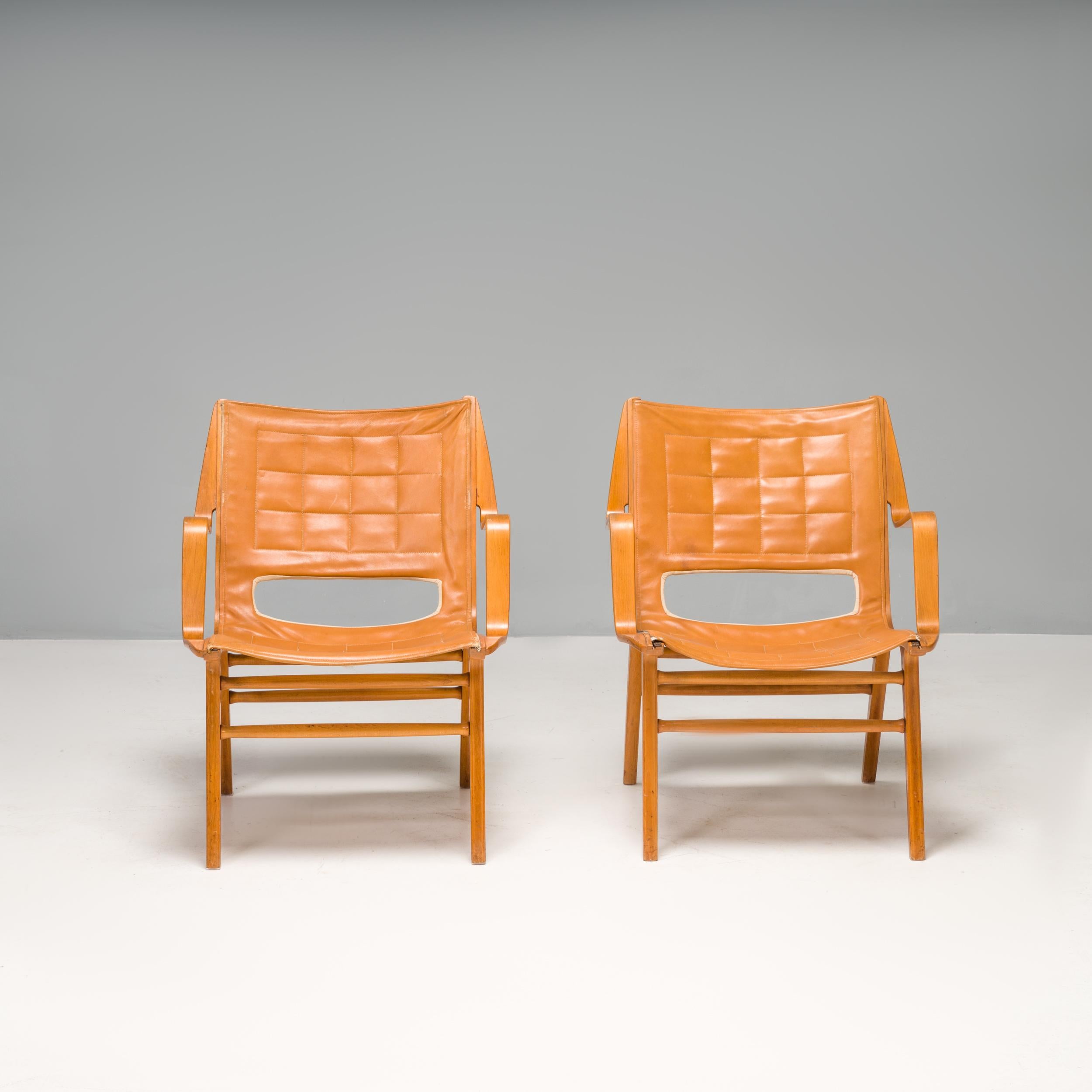 Der 1947 von den dänischen Architekten Peter Hvidt & Orla Mølgaard-Nielsen entworfene Stuhl AX 6060 wurde von Fritz Hansen hergestellt.

Die AX-Stühle sind ein fantastisches Beispiel für das dänische Design der Jahrhundertmitte. Sie bestehen aus