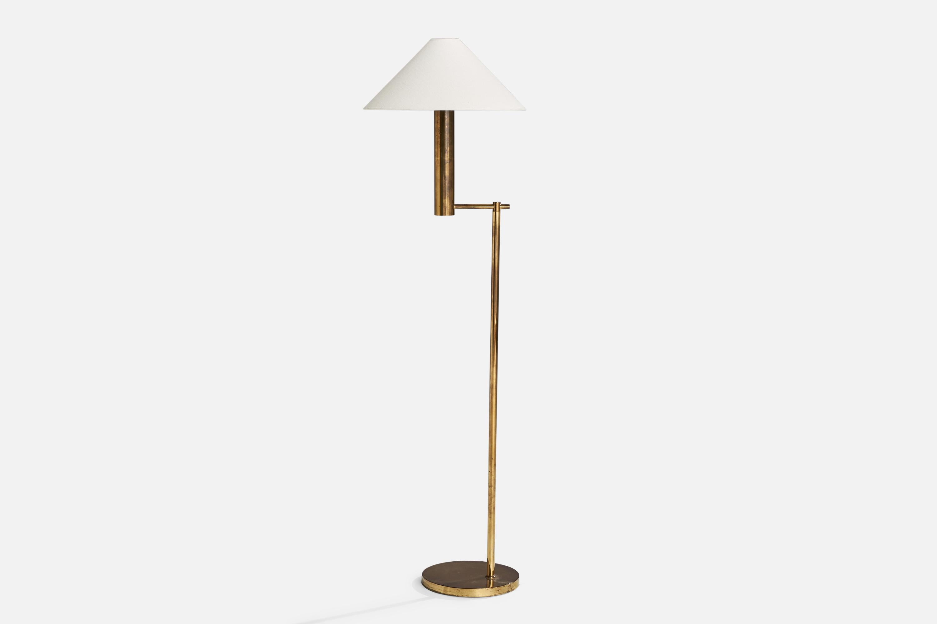 A brass and white fabric floor lamp designed and produced by Høvik Verk, Norway, c. 1960s.

Overall Dimensions (inches): 53.15”  H x 14.18”  W x 16.54”  D
Stated dimensions include shade.
Bulb Specifications: E-26 Bulb
Number of Sockets: 1
All