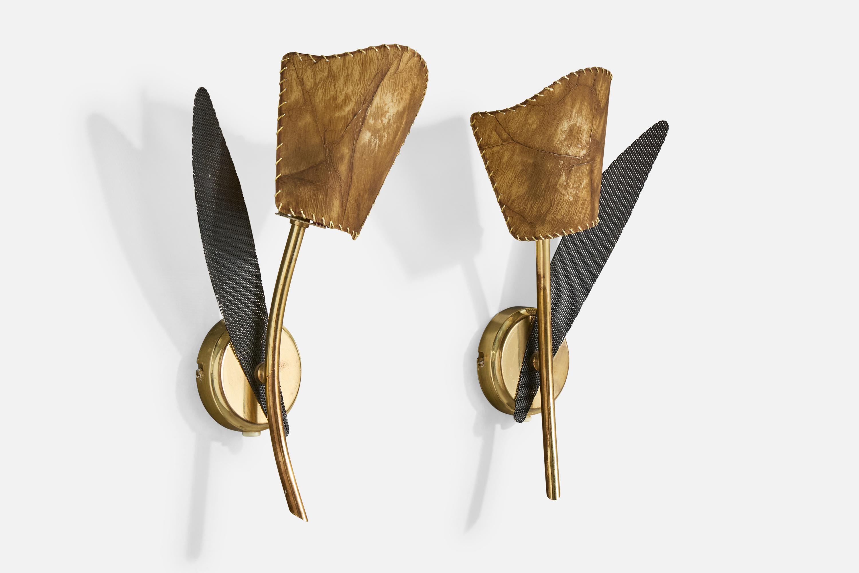 A pair of brass, black-lacquered metal and brown parchment paper wall lights produced by Høvik Verk, Norway, c. 1960s.

The brass backplate and arm presents with light scratching and oxidation on each fixture.

Overall Dimensions (Inches): 12” H x