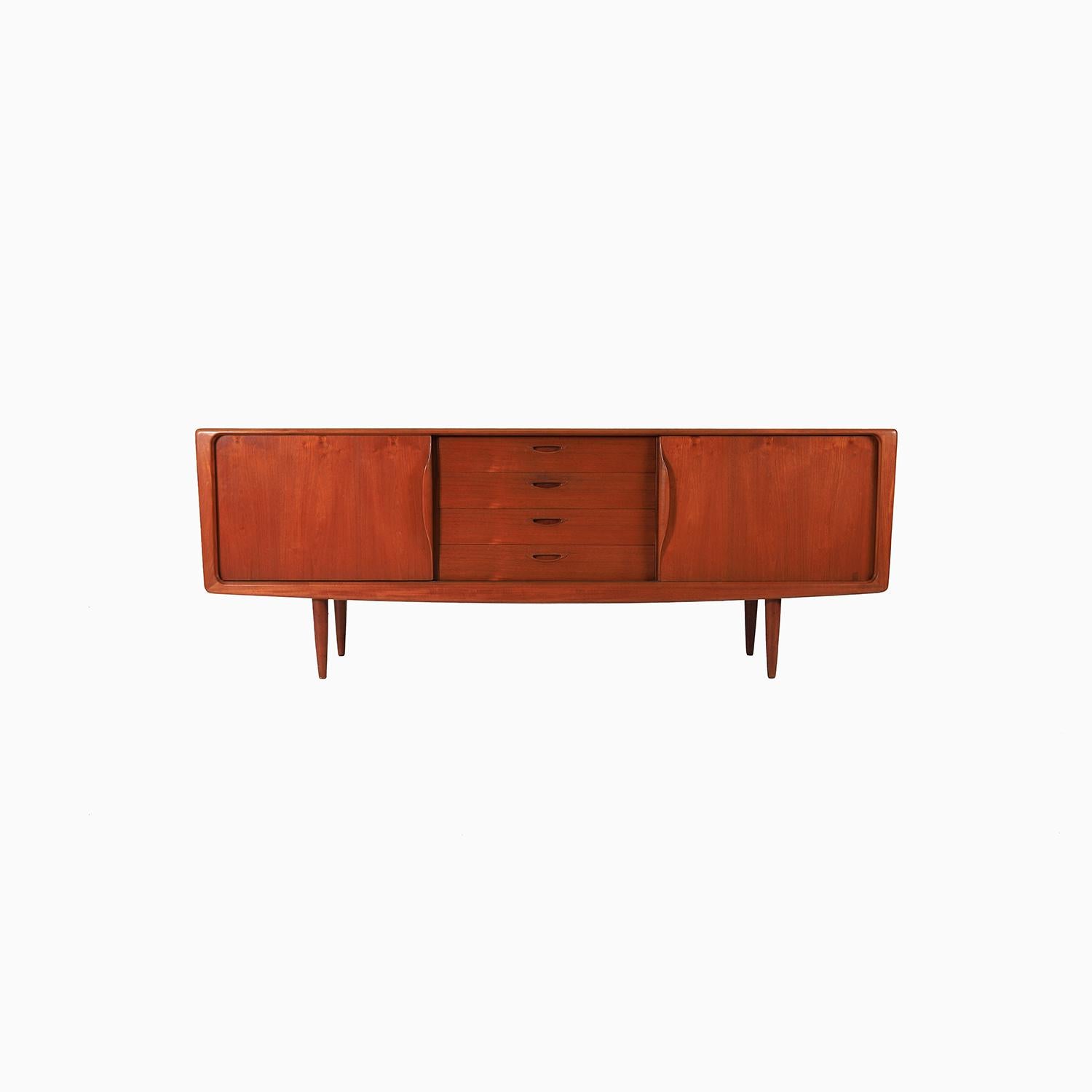 A very well made sideboard designed by HW Klein and produced by Bramin. A longer sideboard with plenty of storage options. A central stack of four drawers and flanking storage with adjustable shelving. Lots of really nice details on this piece.