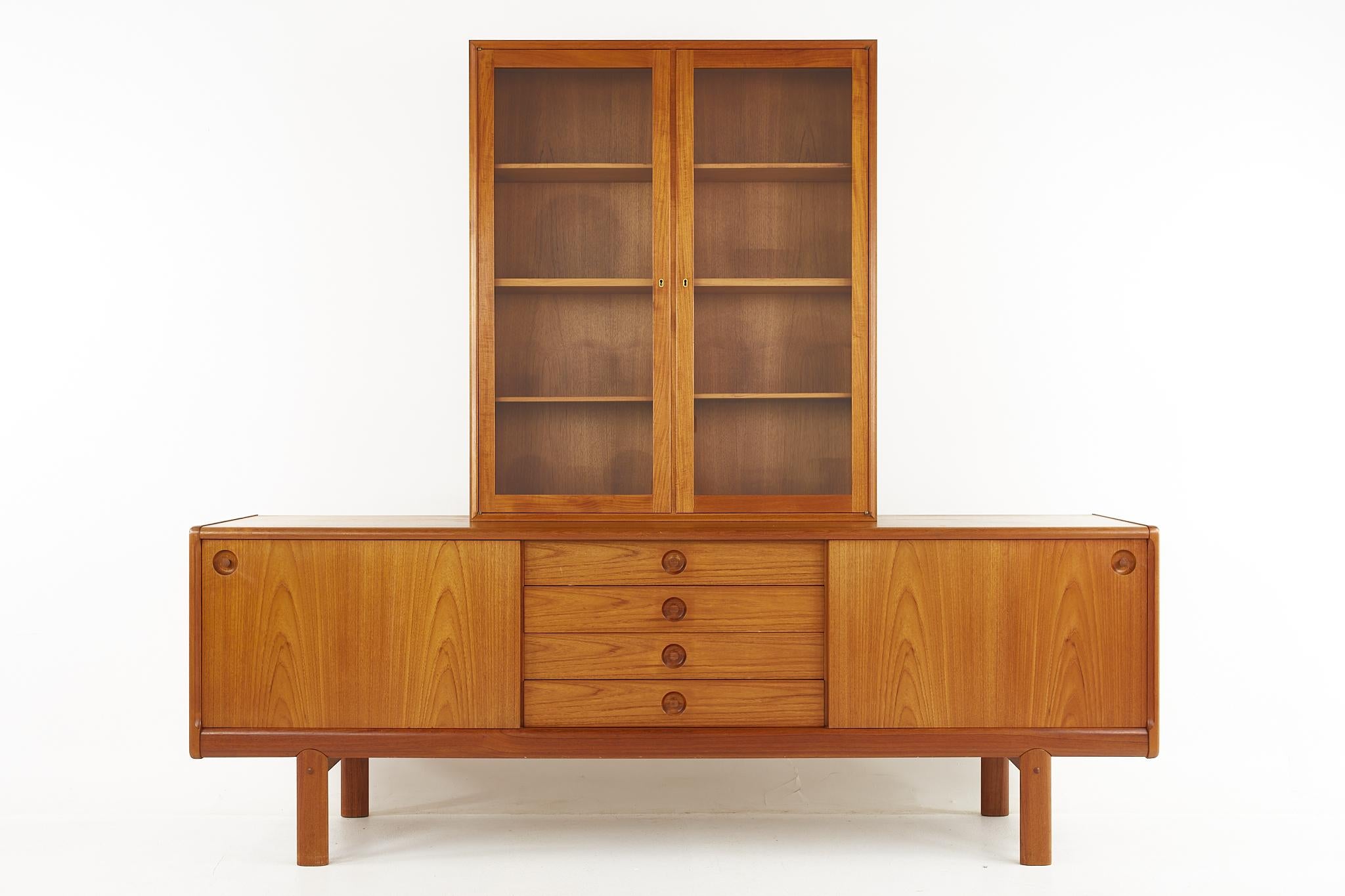 HW Klein for Bramin Møbler mid century danish teak sideboard credenza with hutch

The credenza mesaures: 88.5 wide x 17.75 deep x 31.25 inches high
The hutch measures: 39.25 wide x 9.75 deep x 46.5 inches high

All pieces of furniture can be