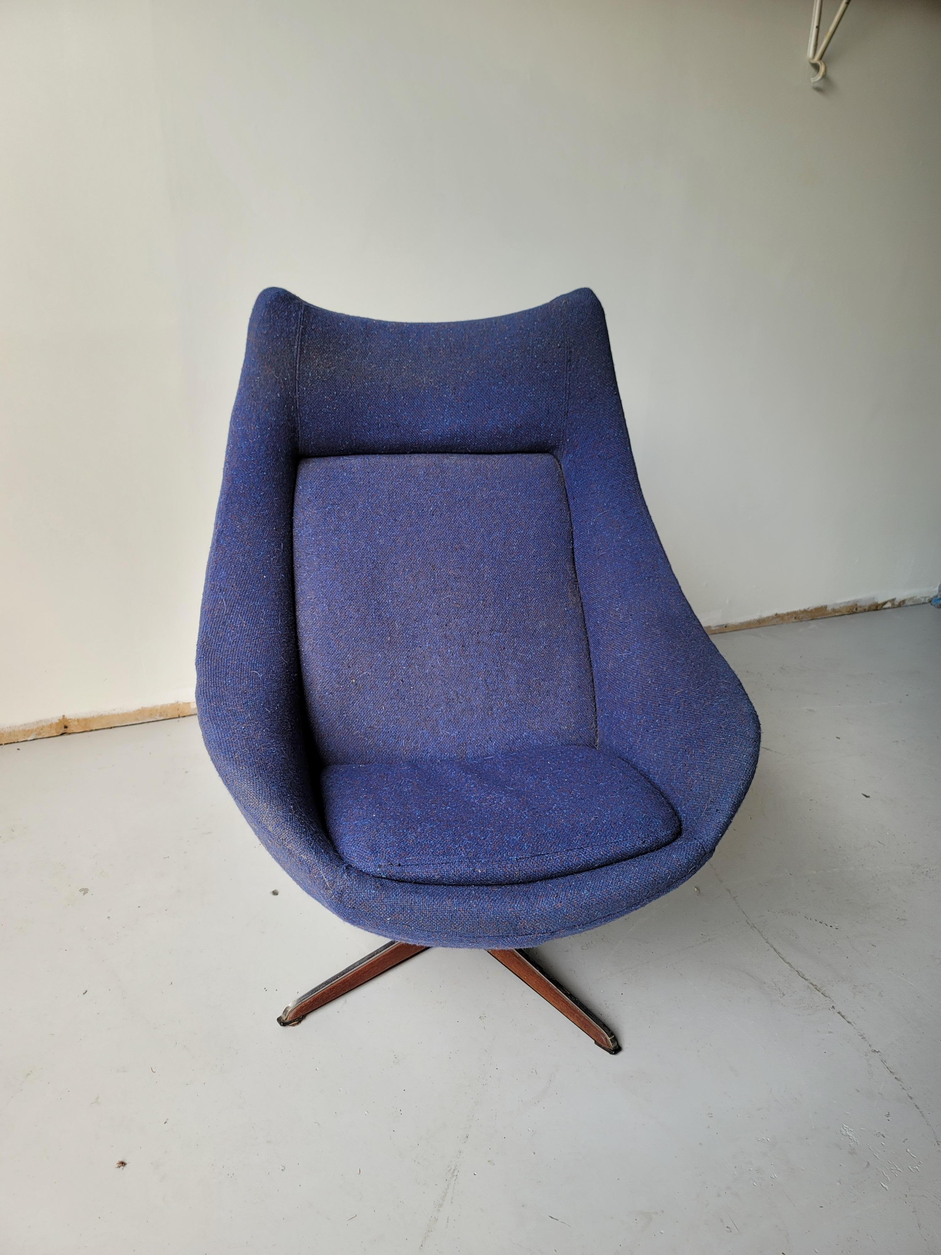 This Danish Modern lounge chair with swivel mechanism was designed by HW Klein for Bramin. The original blue wool uphoulstery is in very good condition. The foam is good and the chair is comfortable and solid. Purchased from the original owner.