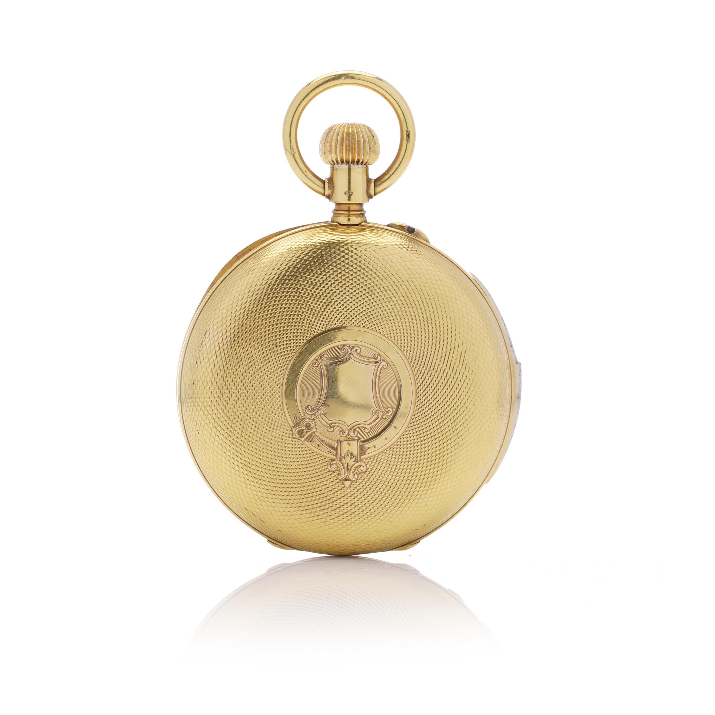 Hy Moser & Cie antique 14kt yellow gold quarter-repeater full hunter case keyless pocket watch.
The watch features an engine-turned design with a plain cartouche shaped like a shield on the front, surrounded by circle and scrolls in the centre. 
The