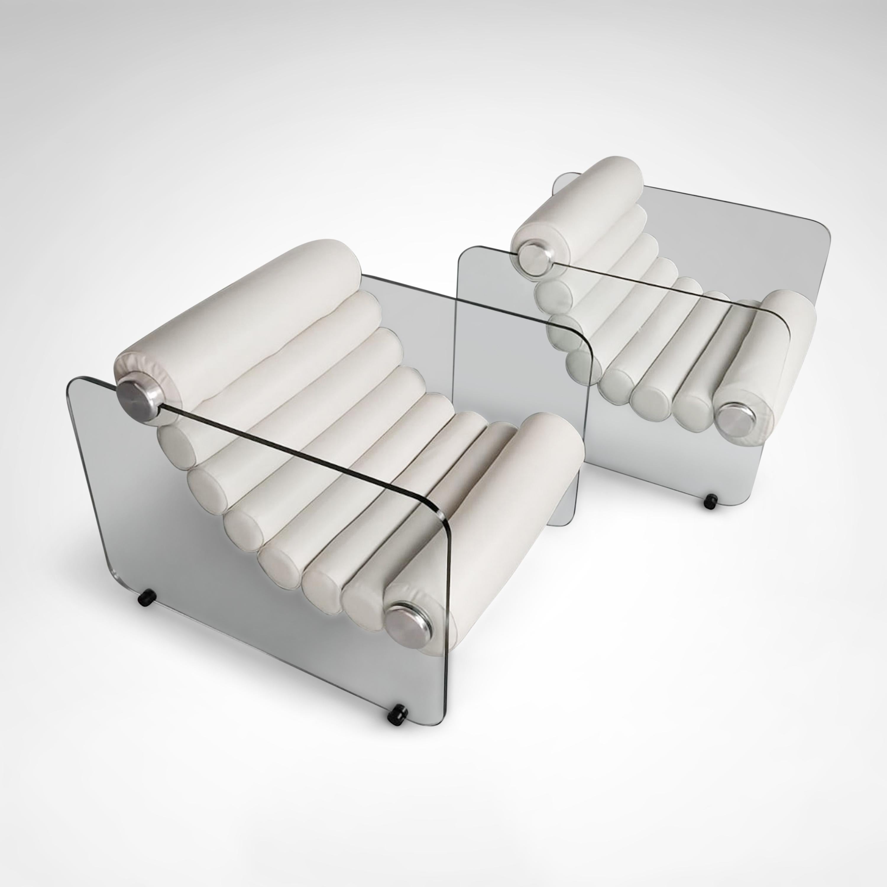 Italian space age design by Fabio Lenci, the Hyaline (pronounced as “Hay’Line) chairs are a prime example of Italian design of the time period.

The thick leather rolls are interconnected in a flexible form and are fixed to the glass plates on the