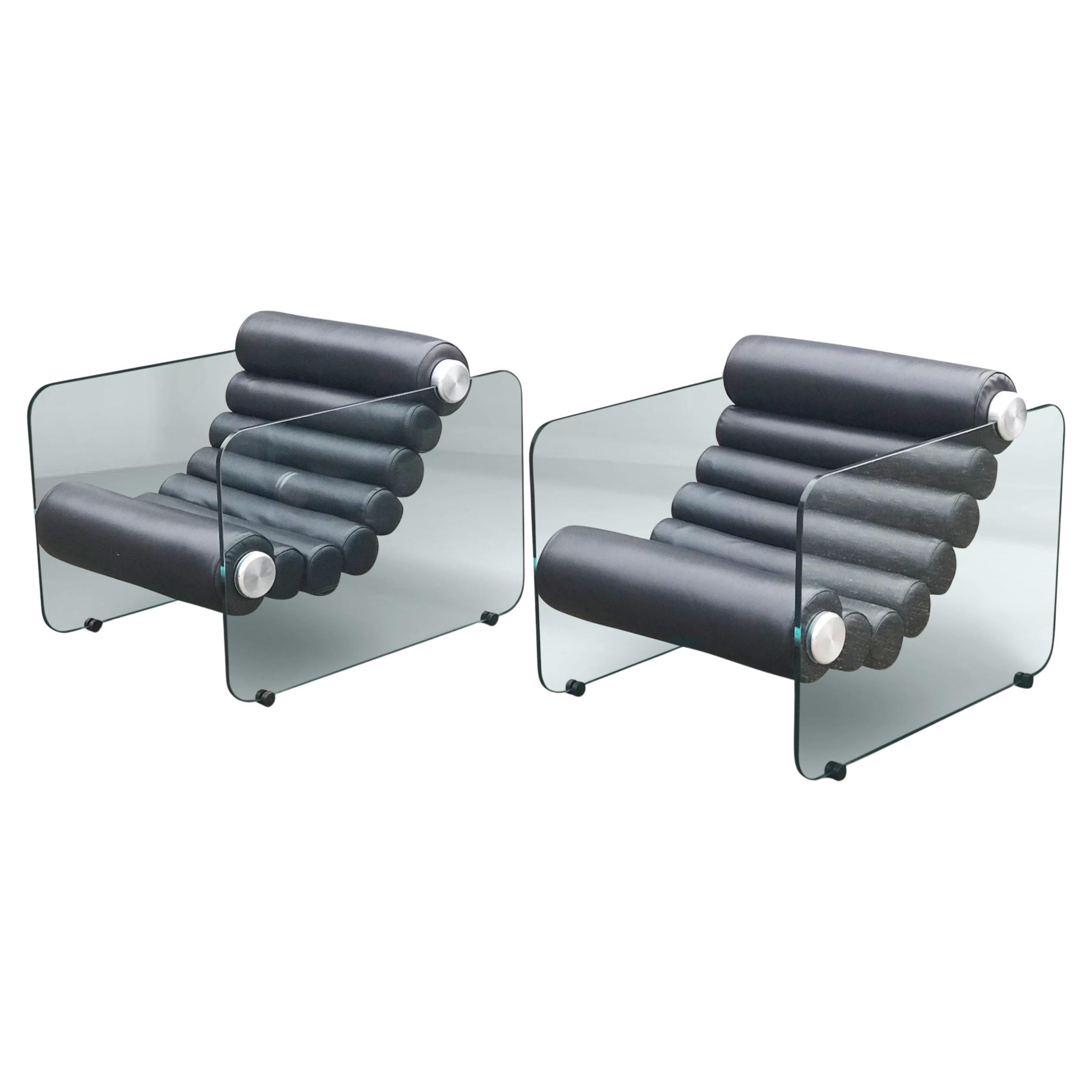 Italian space age design by Fabio Lenci, the Hyaline (pronounced as “Hay’Line) chairs are a prime example of Italian design of the time period.

The thick leather rolls are interconnected in a flexible form and are fixed to the glass plates on the