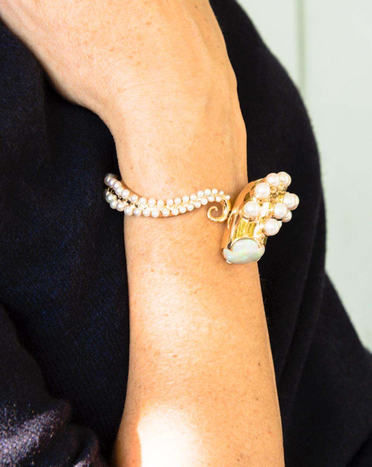 Hydra 18K Rose Gold and Akoya Pearls tentacle Bracelet by Frederique Berman.
Hydra octopus tentacle one of a kind bracelet : 
Hydra's tentacle wraps around the wrist, but its suction cups are soft, capturing the brightness of pearls. 
Hydra, a
