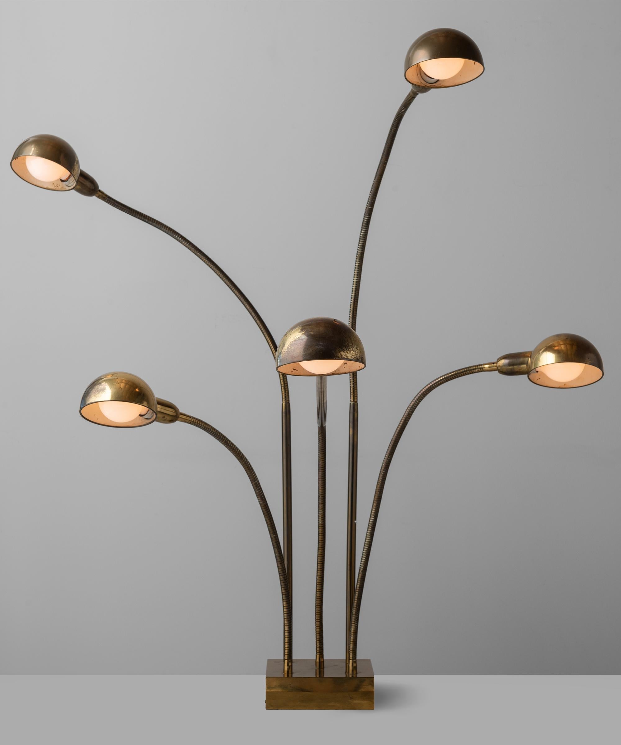 Hydra lamp by Pierre Folie, France circa 1970.

Works as a floor lamp or as a table lamp. Brass lamp with adjustable arms. 8