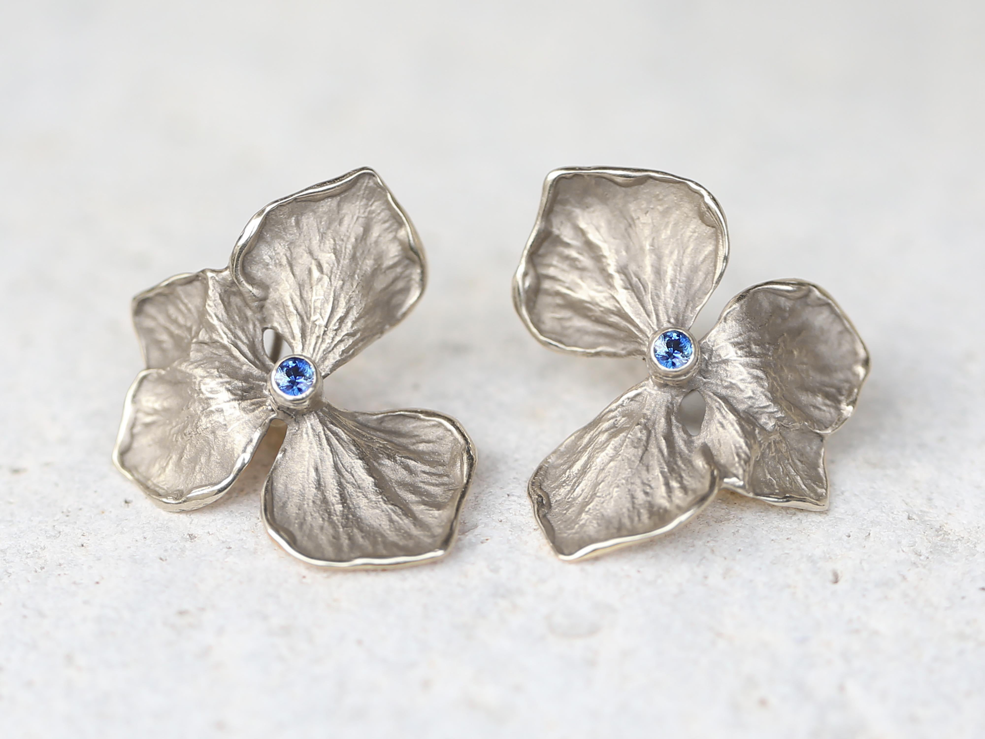 Large Solid White Gold Hydrangea Flower Earrings

These unique earrings are made having a hydrangea flower as a source of inspiration. Each flower is crafted in wax and then cast in gold.

Materials: Flower and Omega Clip: Solid 14k Gold
Size