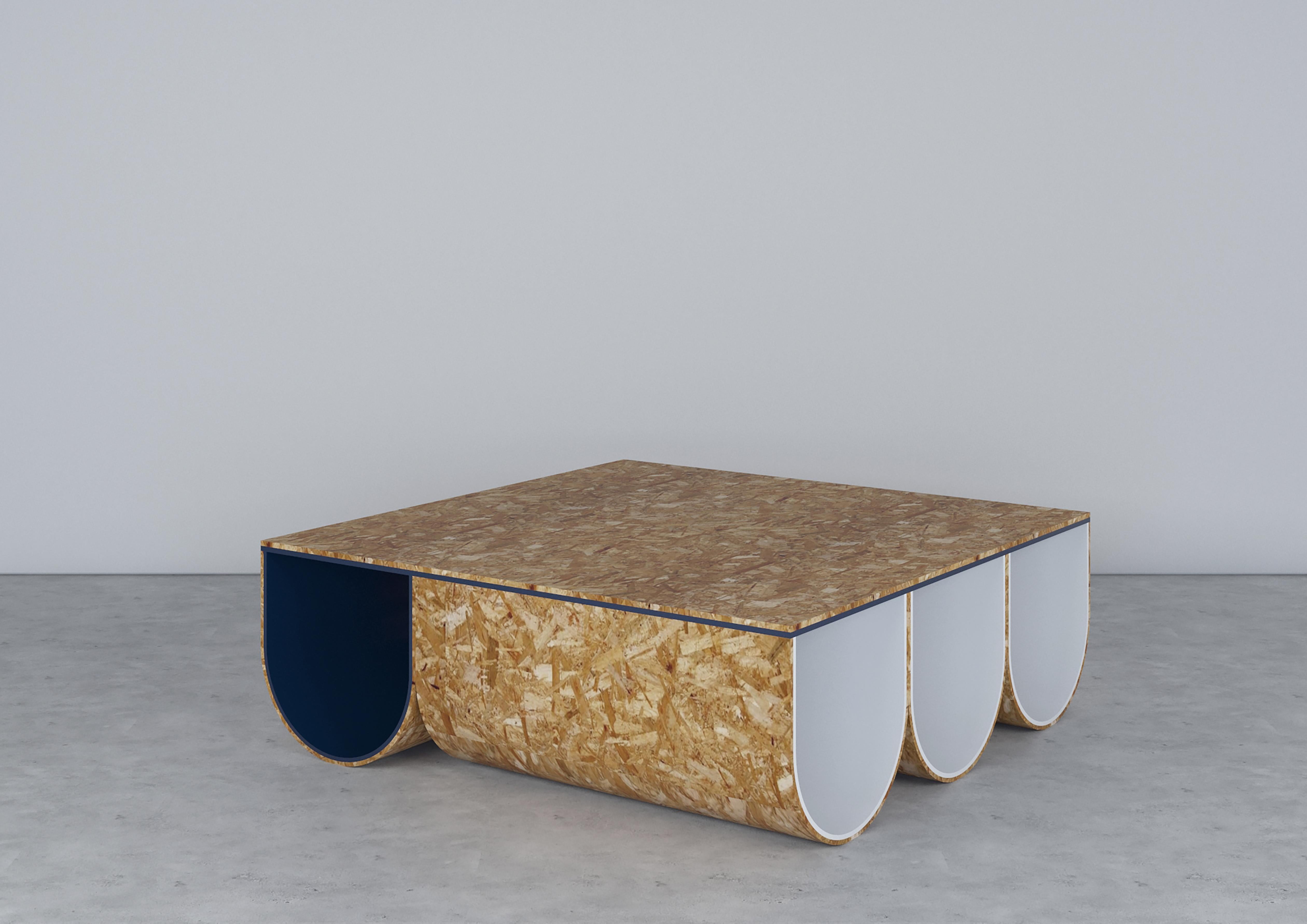 Hygge coffee table by Shou
Dimensions: W 120 x D 120 x H 40 cm
Materials: OSB and MDF laquered painting.

Hygge Coffee Table was designed with inspiration from the Scandinavian philosophy of 'hygge'. It aims to give the space a warm and cozy