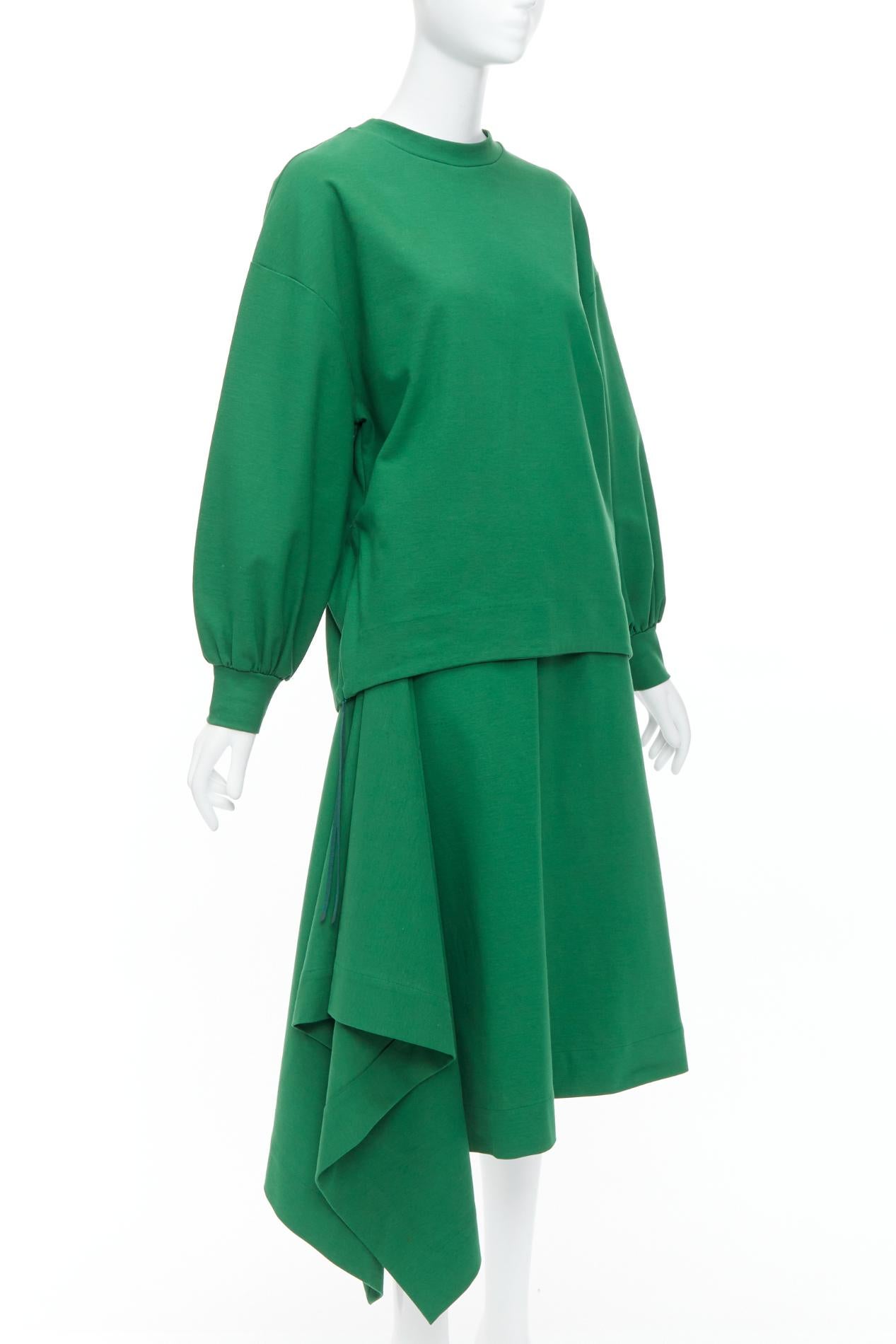 HYKE Grüner Baumwollpullover Pullover mit asymmetrischem Saum Rock Set JP2 M
Referenz: NKLL/A00302
Marke: Hyke
MATERIAL: Baumwolle, Gemisch
Farbe: Grün
Muster: Solide
Verschluss: Slip On
Hergestellt in: Japan

ZUSTAND:
Zustand: Sehr gut, dieser
