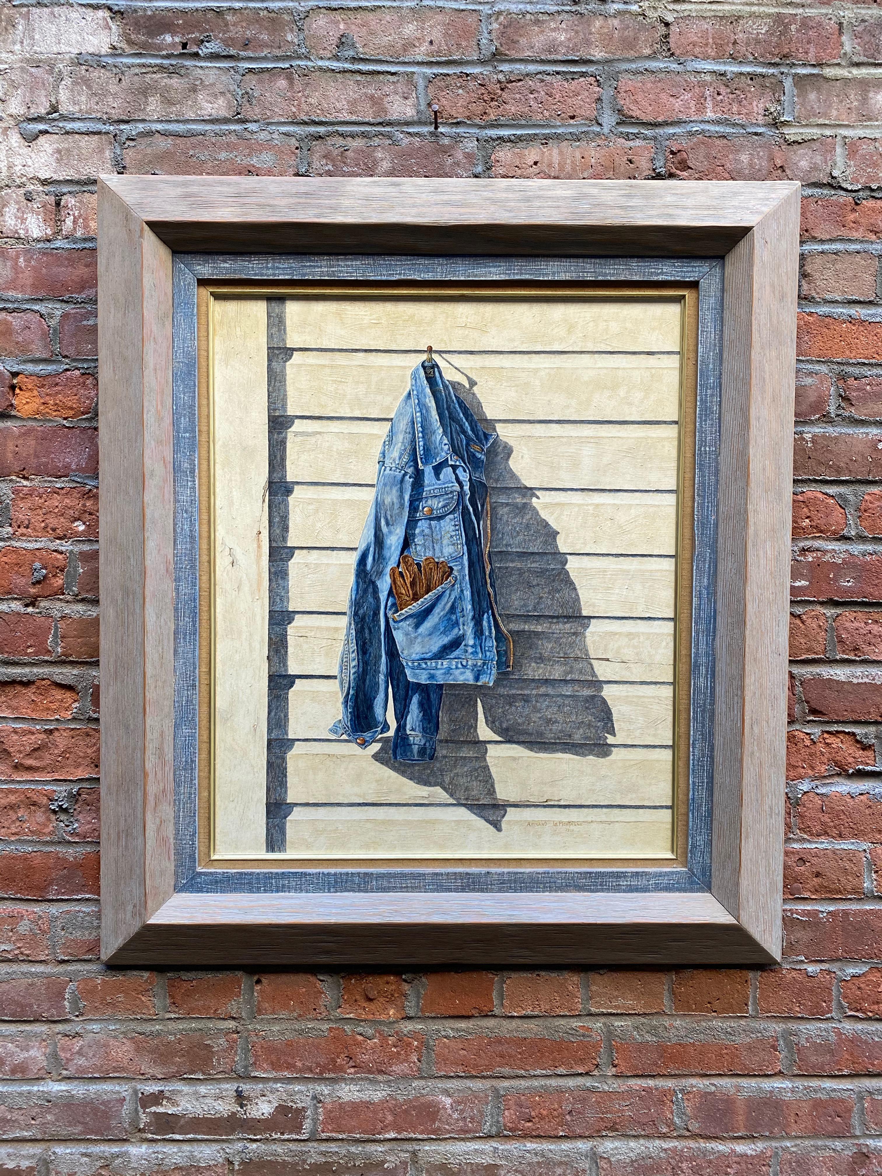 Hyper Realist oil painting on Masonite board by Armand LaMontagne. Signed and dated, Armand LaMontagne, 1981. LaMontagne (born 1939) has produced one of his painstakingly realistic and detailed renderings of a rumpled denim work coat with gloves on
