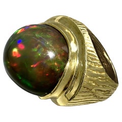 "Hypnotica" Cocktail Ring in 18 Karat Yellow Gold with 22 Carat Ethiopian Opal