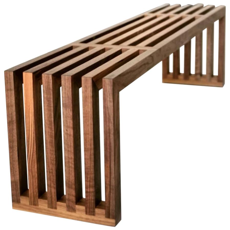 Hypnotizm is the perfect bench for entryway, foot of your bed, additional dining room seating, or as a hall table. With an obvious nod to George Nelson, this slatted bench is visually light but impactful. Height, width, and length are all