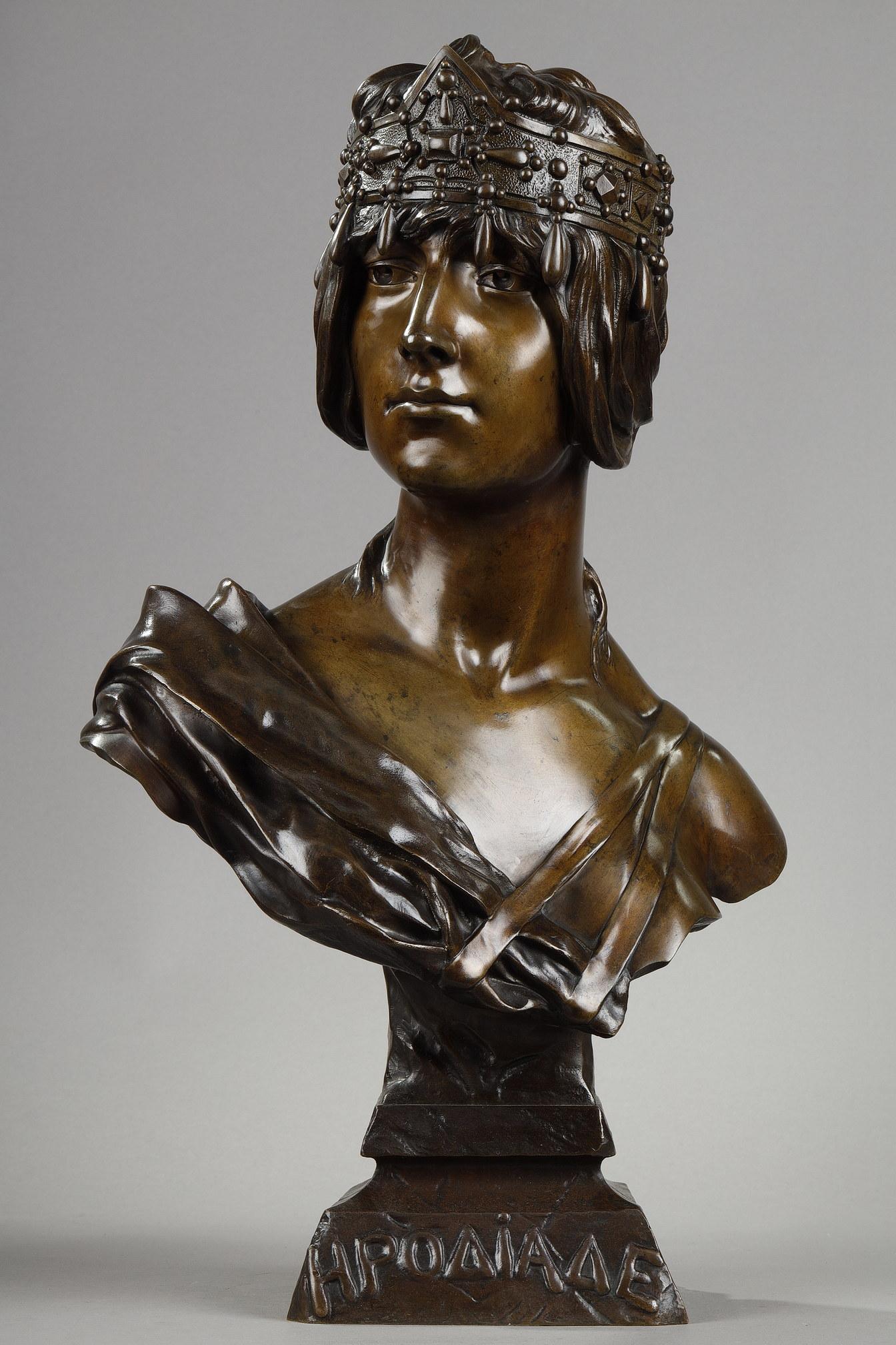 Bronze bust with brown patina, titled in Greek