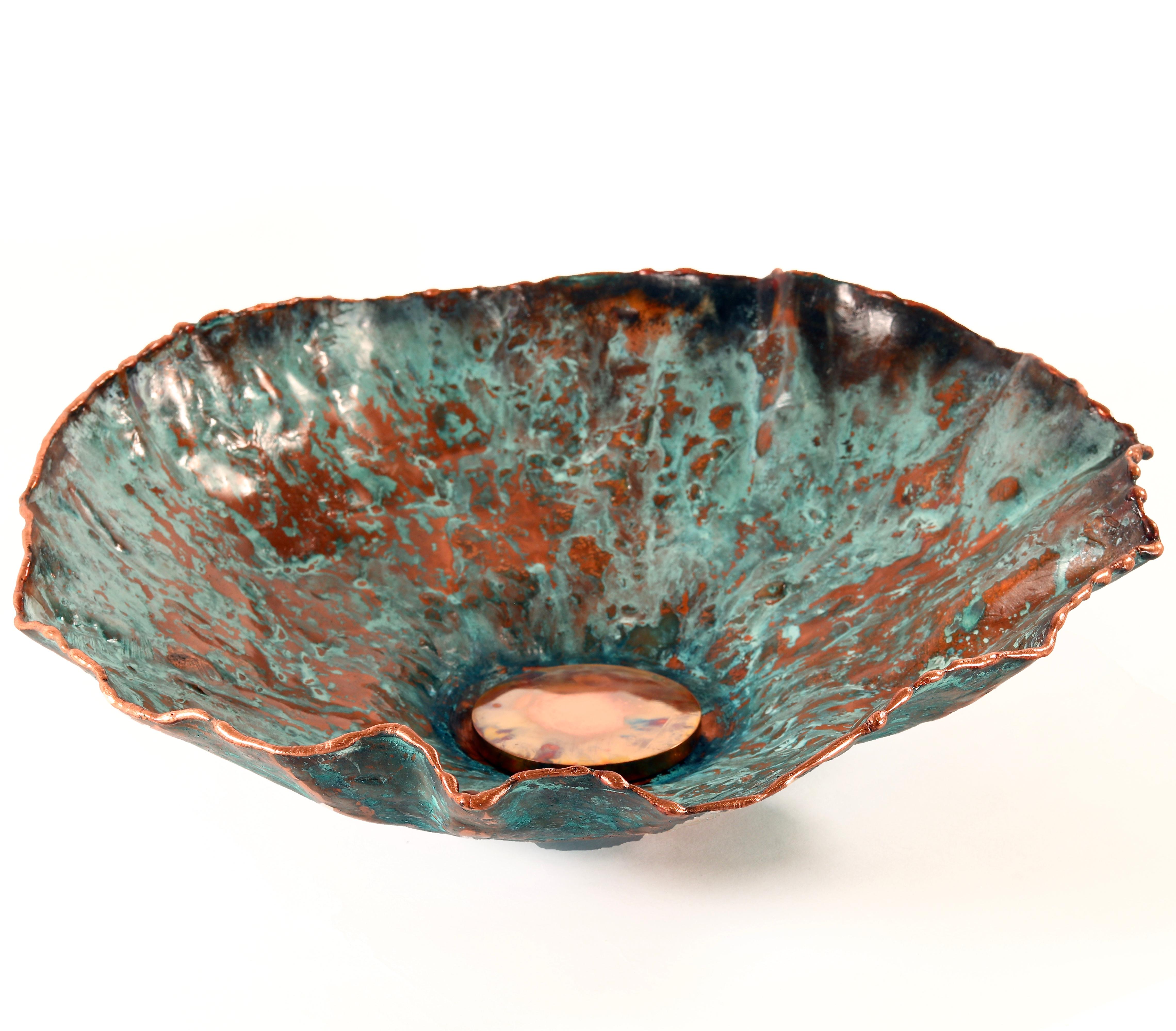 Hypomea copper bowl by Samuel Costantini
Dimensions: D25 x H8 cm
Materials: copper

Copper bowl worked en-rely by hand.
The oxydation of copper is realized only with natural product.
Limited editon of 9 numerated pieces.

Samuel