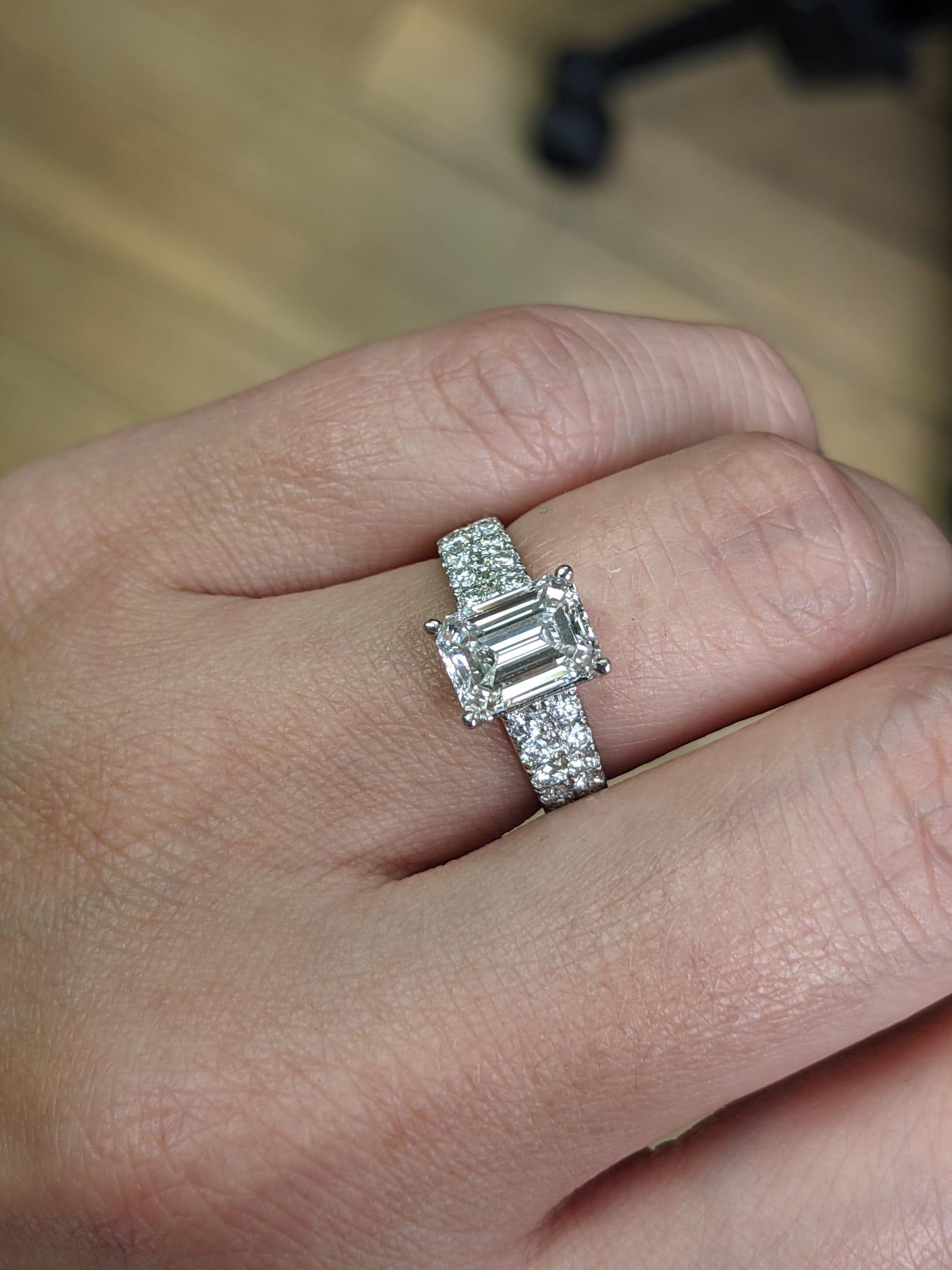 double band emerald cut engagement ring