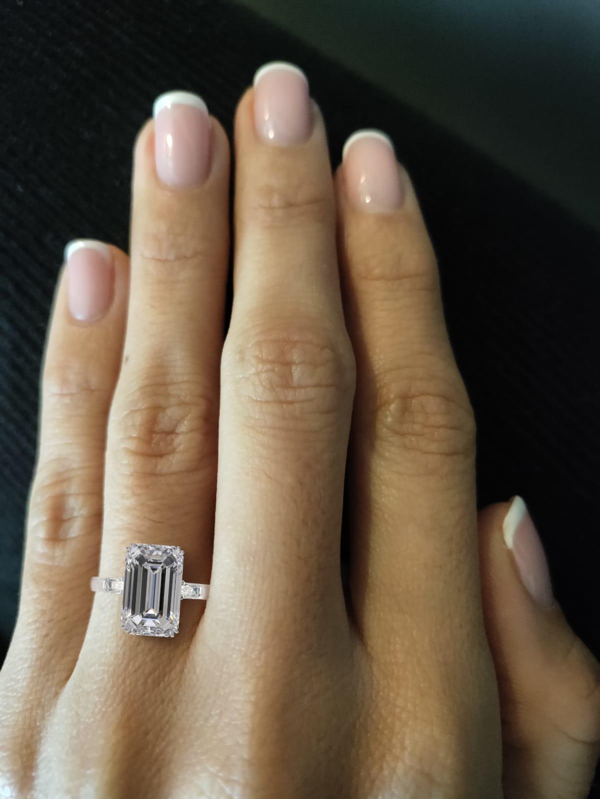 Exquisite Antinori Fine Jewels engagement ring crafted in platinum, featuring an exceptional GIA certified long emerald cut diamond weighing 3.01 carats, H color, VVS2 clarity. The ring has perfect proportions having.

This spectacular diamond