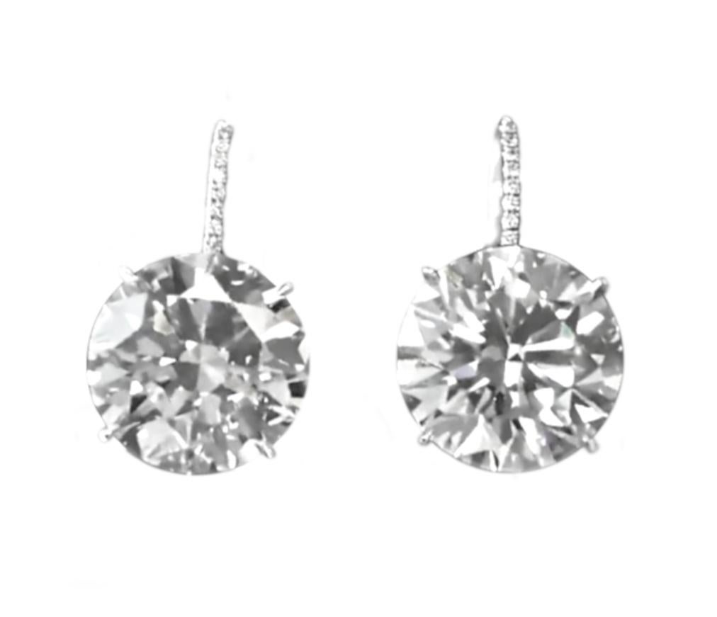 lovely dangle earrings with both GIA certified round brilliant cut diamonds 
