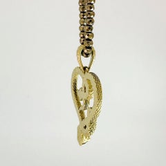 "I Heart Snakes II" Pendant with Green Diamonds in 18k Gold with Pyrite Chain