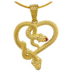 "I Heart Snakes" Twisted Snake Heart Pendant in 18K Gold with Diamond & Ruby
