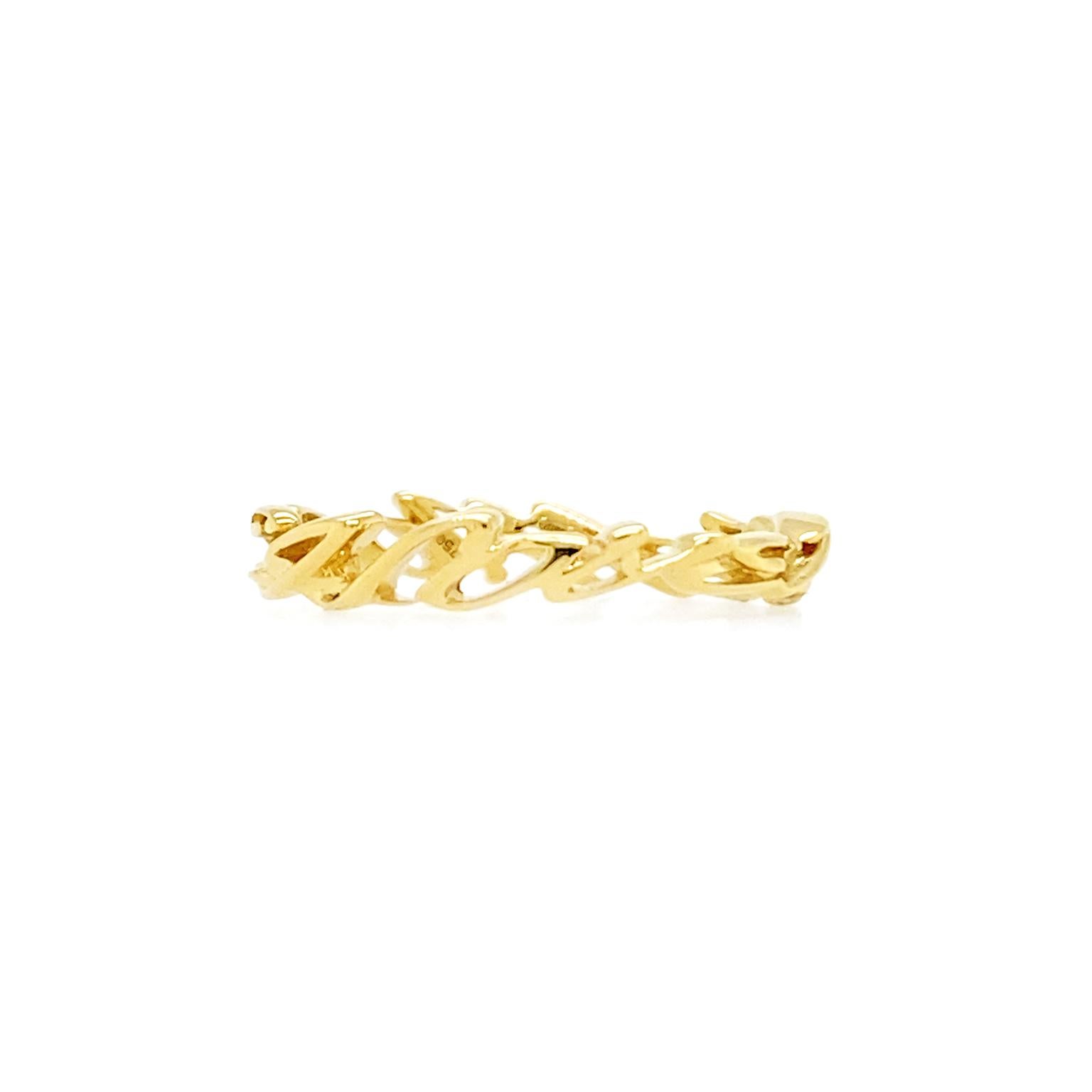 This ring’s statement is small but powerful. Rather than a traditional band, it’s made of cursive block letters 3mm high. Together, they say 'I love me more.' The ring is crafted in 18k yellow gold, prized for its color and ease of shaping. A soft