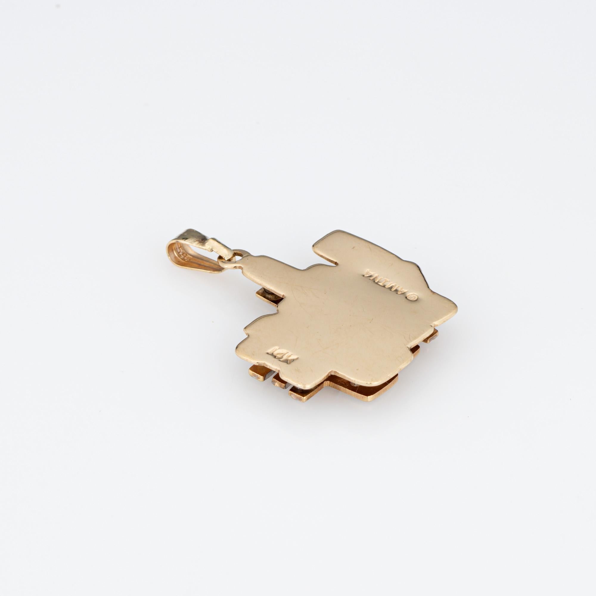 Finely detailed 3D vintage 'I Love You' charm crafted in 14k yellow gold.  

Three small diamonds total an estimated 0.02 carats (estimated at L-M color and I1 clarity). The sweet pendant or charm features 