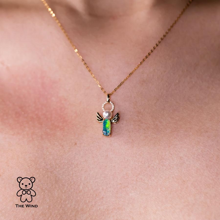 Australian Boulder Opal & Akoya Pearl Pendant 18K Yellow Gold with Diamonds Necklace.

Design name: I Love You, My Angel!

Design Idea: The idea is simply that I want to create something for my love, my angel!

Free Domestic USPS First Class