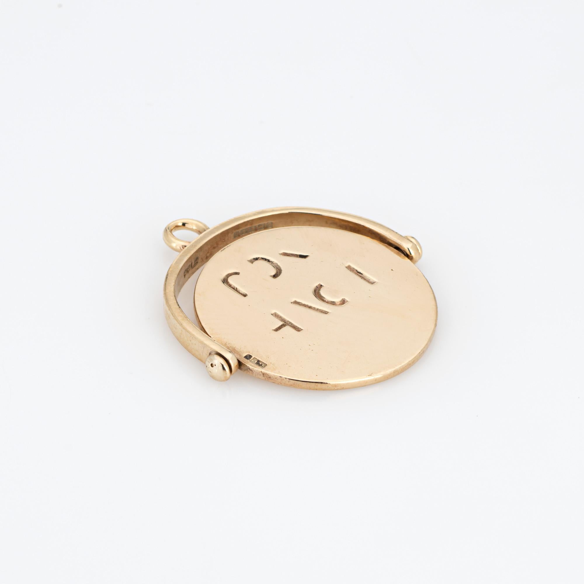 Finely detailed vintage 'I Love You' charm crafted in 9k yellow gold (circa 1970s).  

The sweet charm features a hidden message. With a flick the charm moves in 360 degree motion (and fast!) to read 