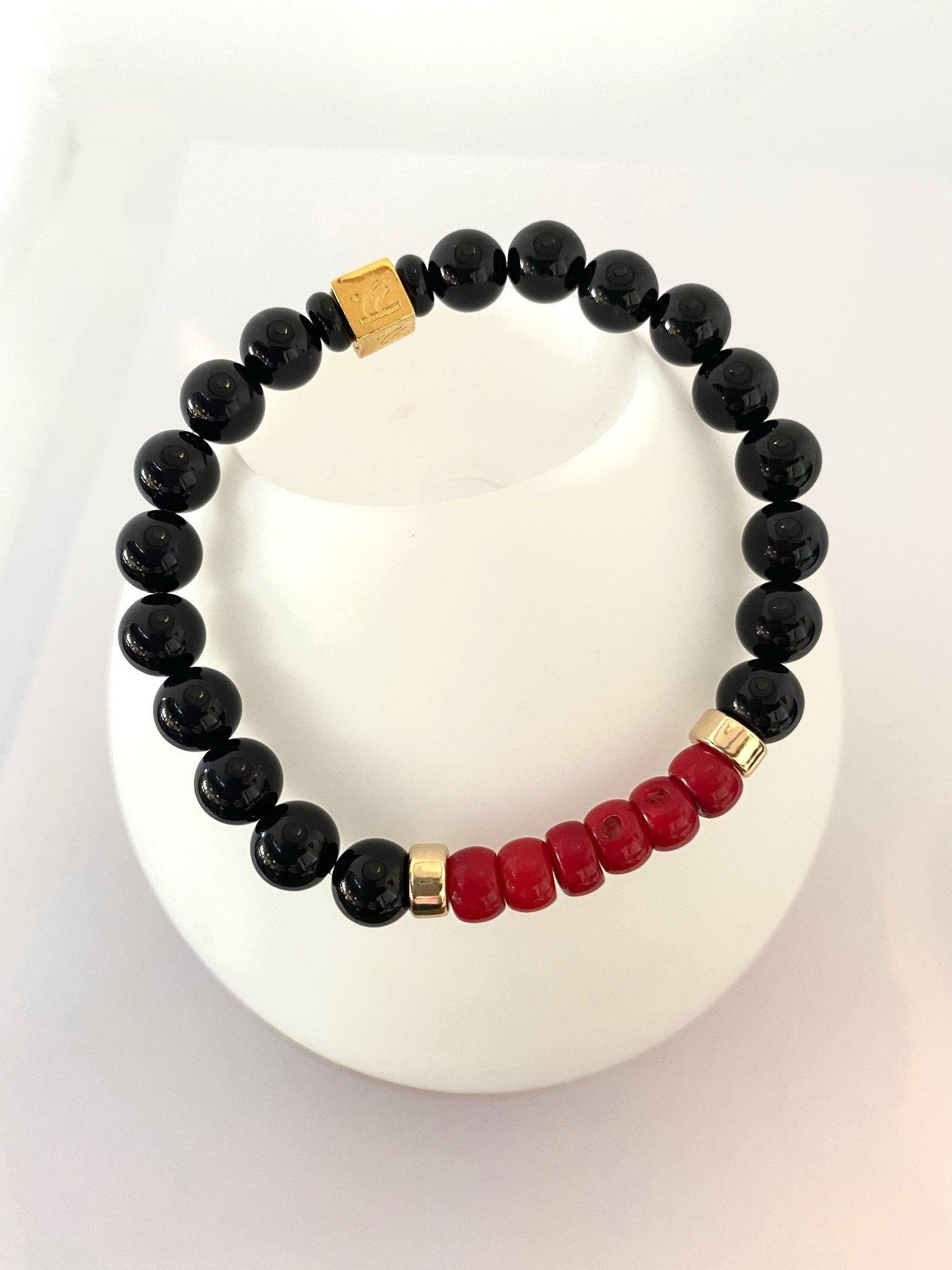 Story Behind the Jewelry:
The 14K gold filled, agate and coral bracelet was designed with round circle stones. Circles are the universal symbol for endless meaning. We have used circles in our Valentines Collection for the a symbol of endless love.