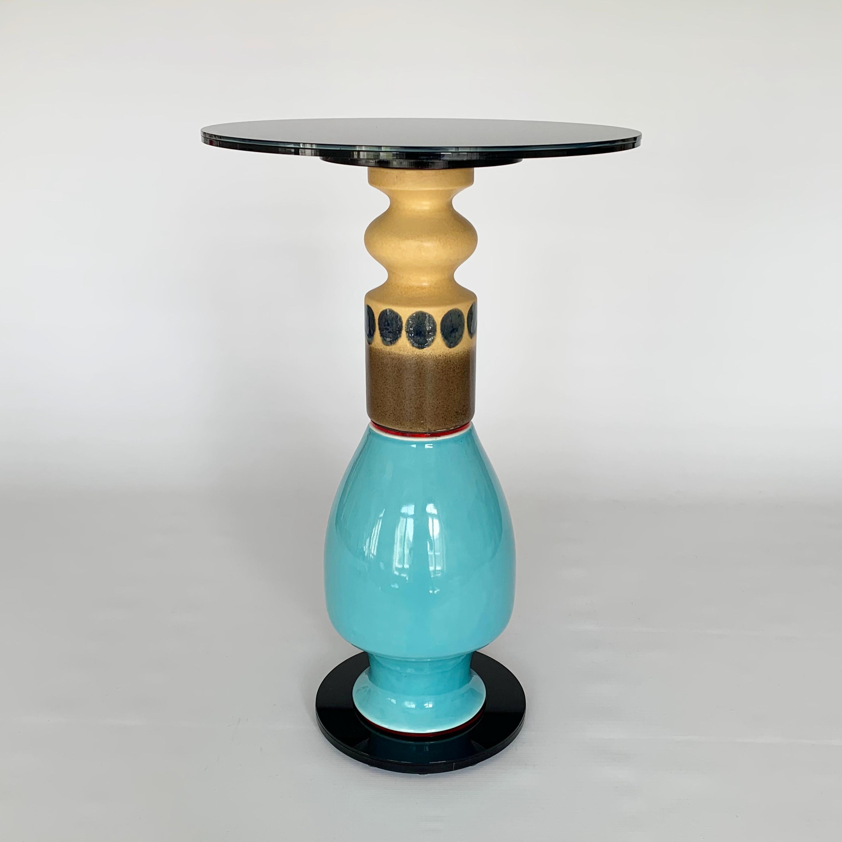Designer and Artis Andreas Berlin created a collection of extraordinary side tables. This tables are sculptures and high end useful upcycling tables. The vases found in antiquarian stores become a new life as a segment of a sculpture. A clever