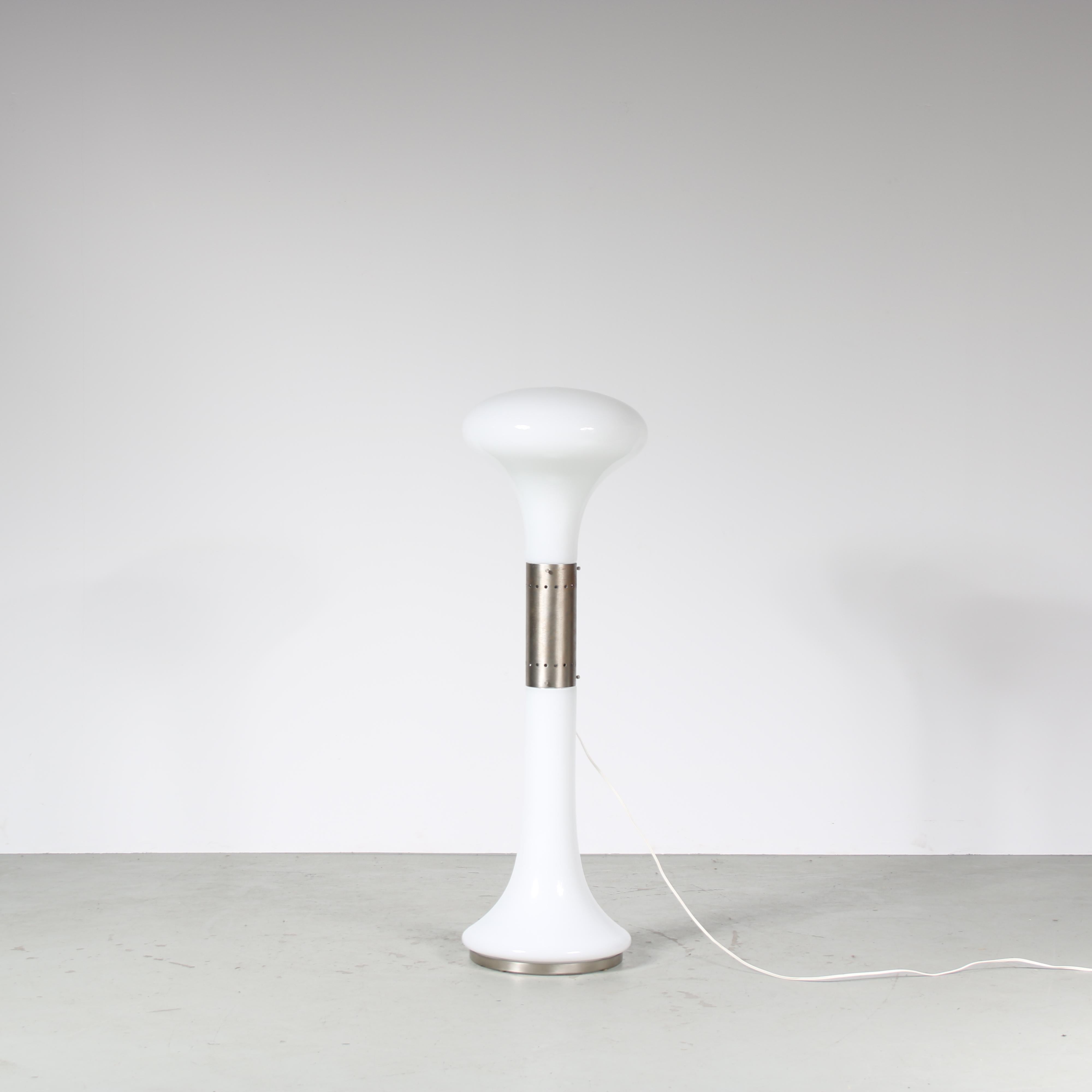 An eye-catching “I Numerati Soffiato” floor lamp designed by Carlo Nason and manufactured by Mazzega in Italy around 1970.

This stunning floor lamp has a unique and most appealing style. The lamp features a beautiful, white glass base that gives it