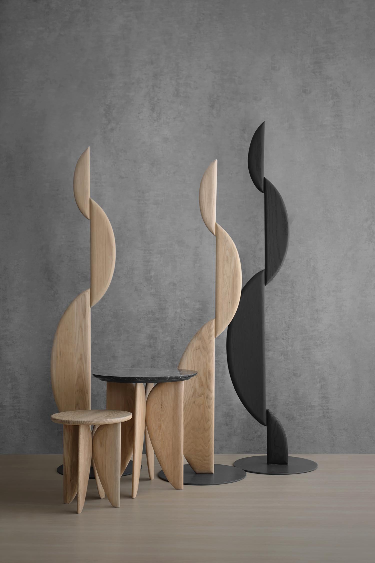 The I Primera Sculpture is part of Noviembre collection, which offers a compelling range of furniture, inviting exploration of form, function, and the serene lines that define each piece. Inspired by Constantin Brancusi's artistic philosophy, the