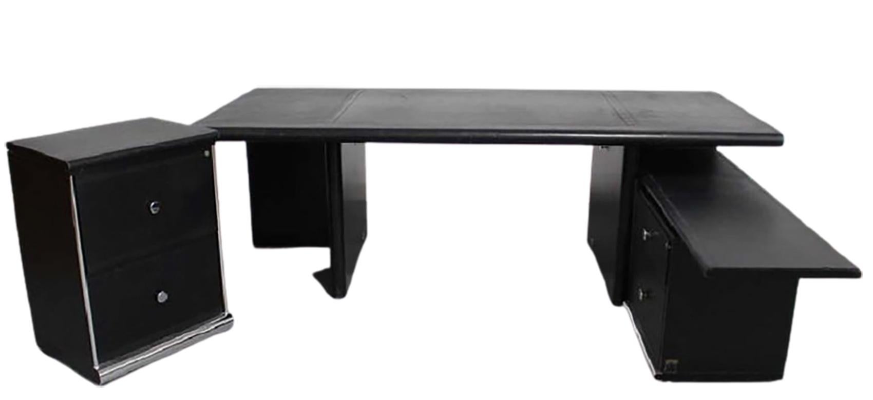 Fine and Sturdy Desk by Italian Designer i4 Mariani for The Pace Collection. Black on Black with Chrome hardware. Mid-century modern looking, circa 1974, wood with black laminated surfaces, tooled leather top 86.5