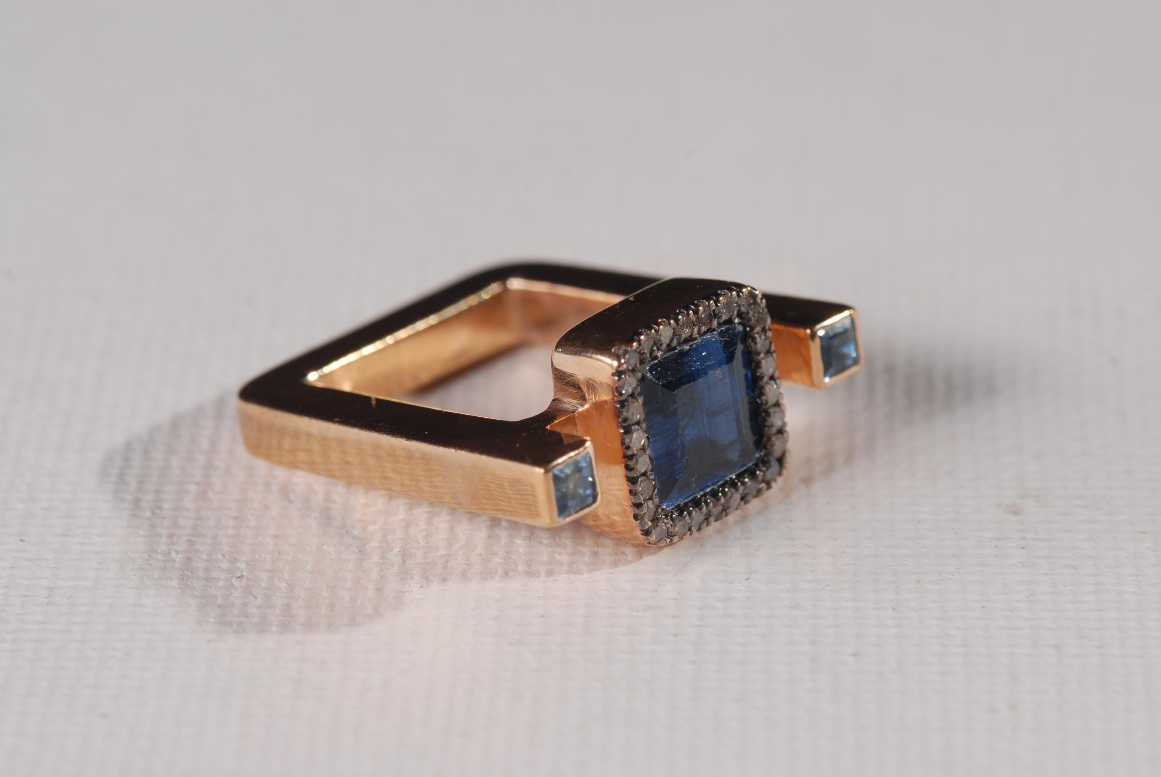 Gold Plated silver contemporary cocktail rectangular ring with square blue sapphires and diamonds.