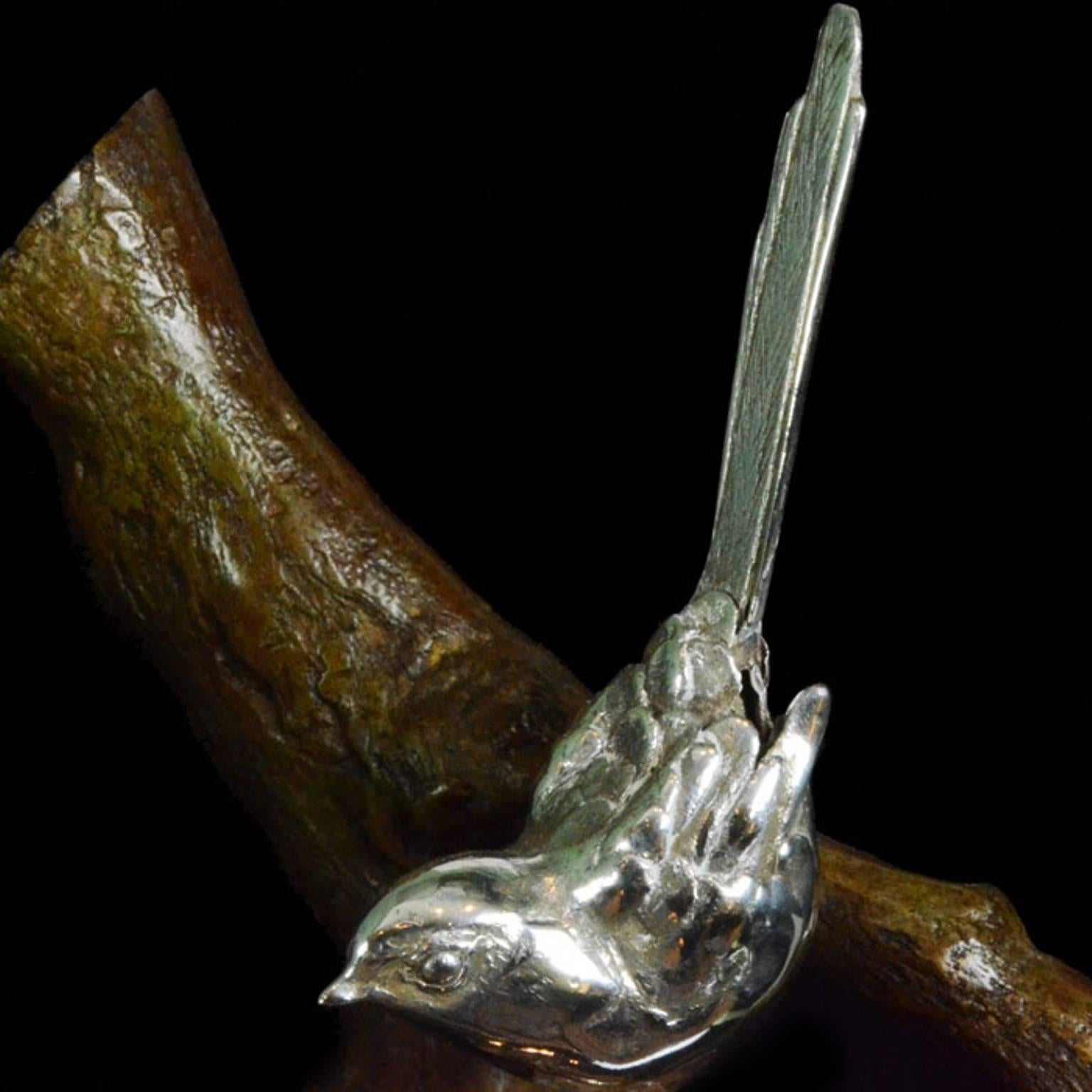 A pair of silver long-tailed tits on a bronze branch  - Sculpture by Ian Bowles
