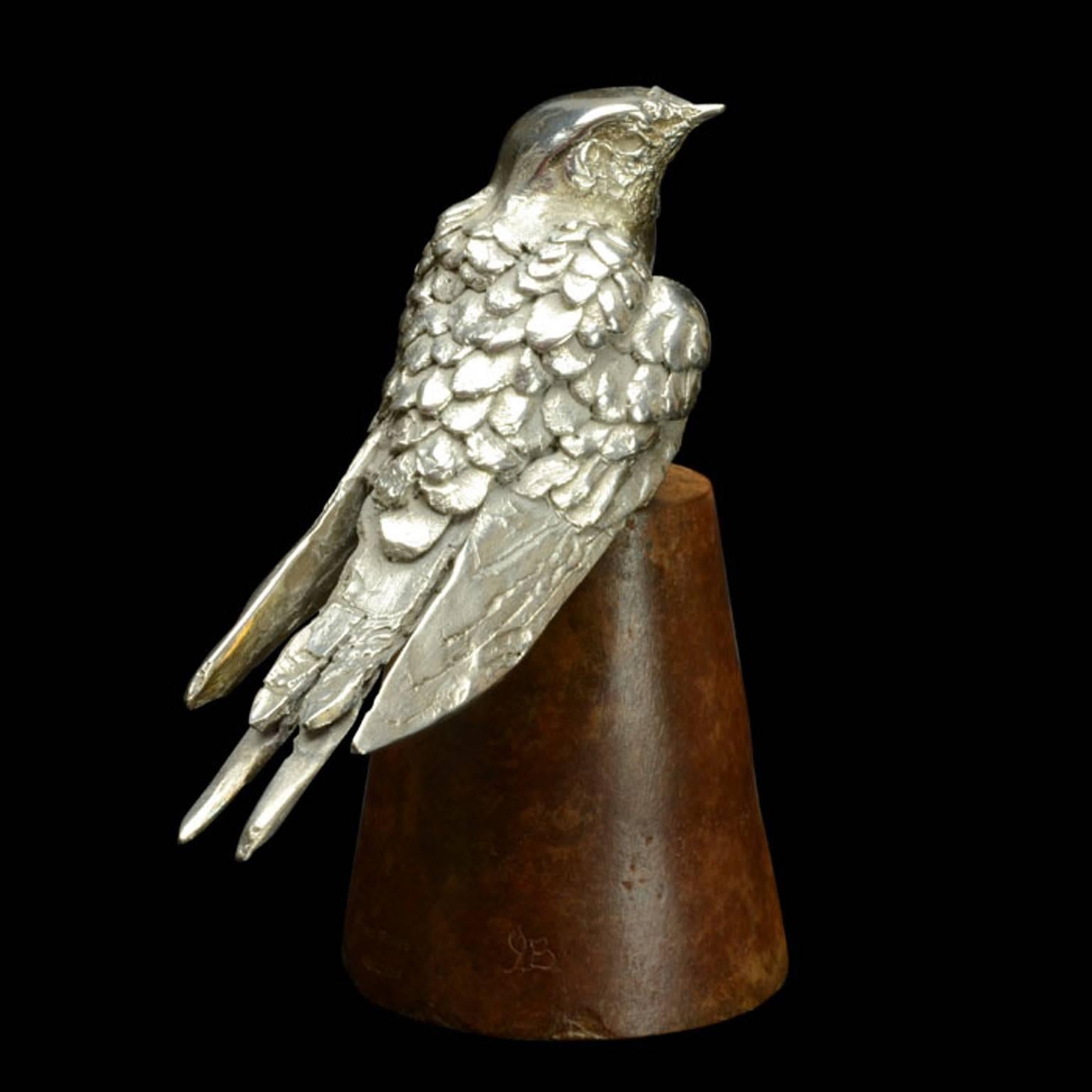 'Swallow on Flowerpot' sterling silver and bronze sculpture by Ian Bowles, the finely modelled life-size swallow in limited edition exclusively for Hancocks.
Contemporary 
13 cm high x 13cm long x 6.50cm wide
783 grams