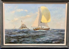 Antique English 20th century Yacht racing off the the Fast Lighthouse of Ireland.