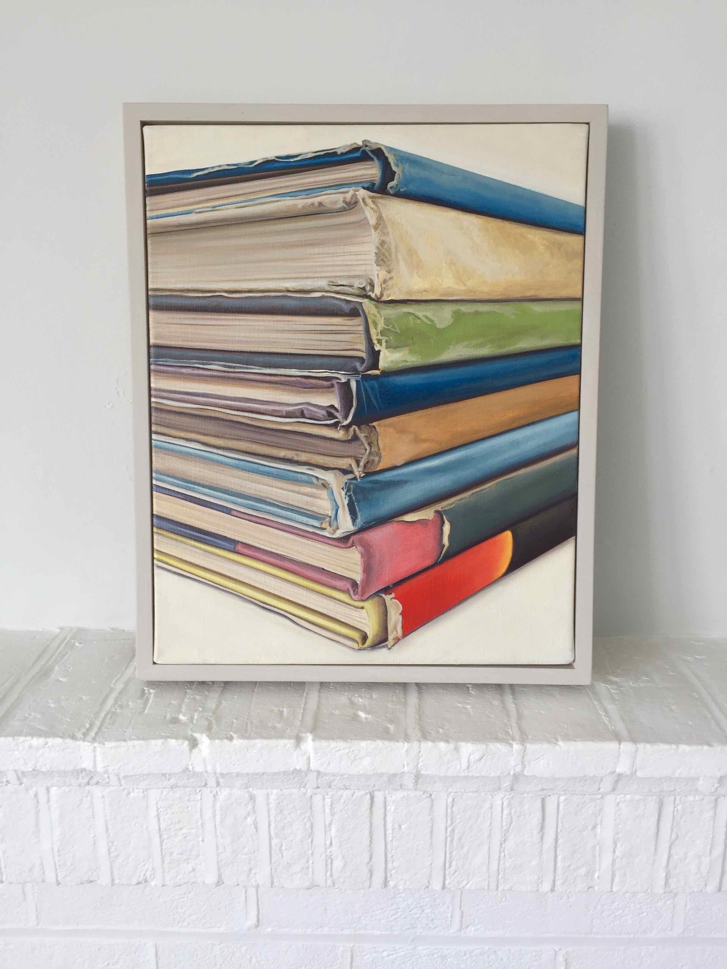 This colourful painting of a bookstack is based on Ian’s time spent in the studio of the famed painter, Patrick Hughes. It is painted on stretched linen and set in a pale grey wooden tray frame. Very fitting for a library or study.

Ian Robinson’s
