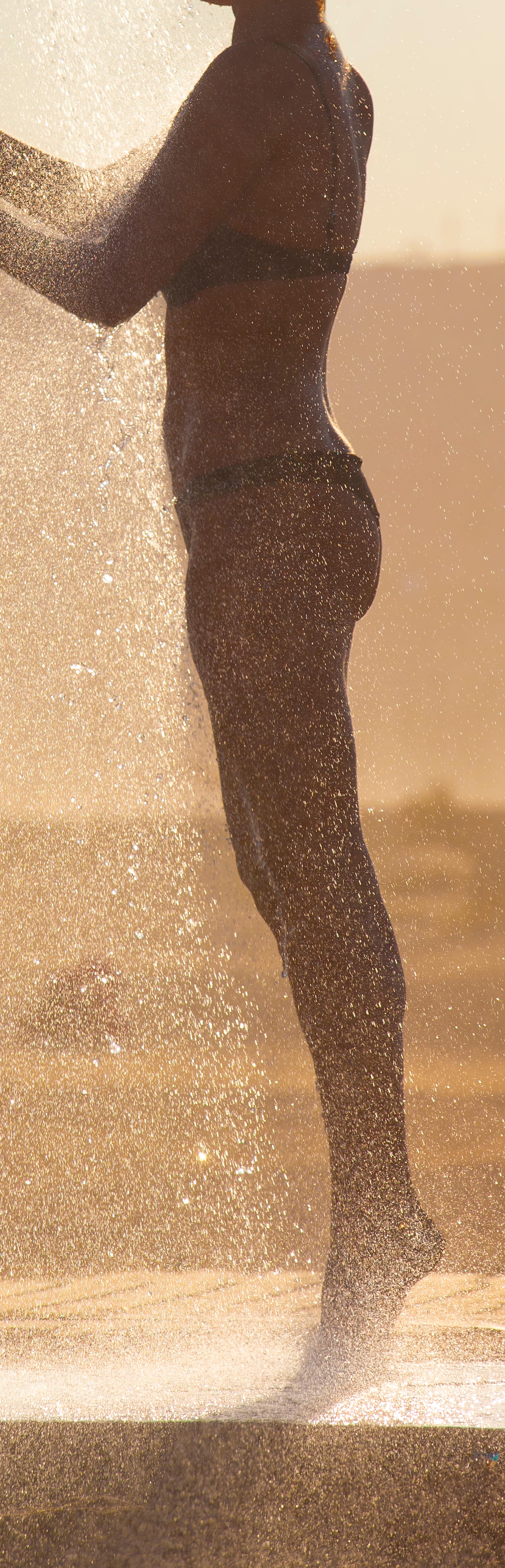 Beneath the Setting Sun - Color gold photo, Limited edition print, Sunset Shower - Modern Photograph by Ian Sanderson