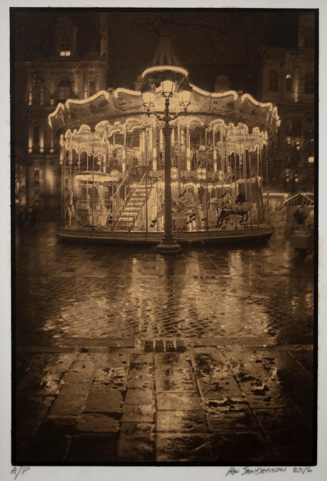 Framed Print-Carrousel-Platinum Palladium print on vellum over 24 carat gold A/P - Photograph by Ian Sanderson