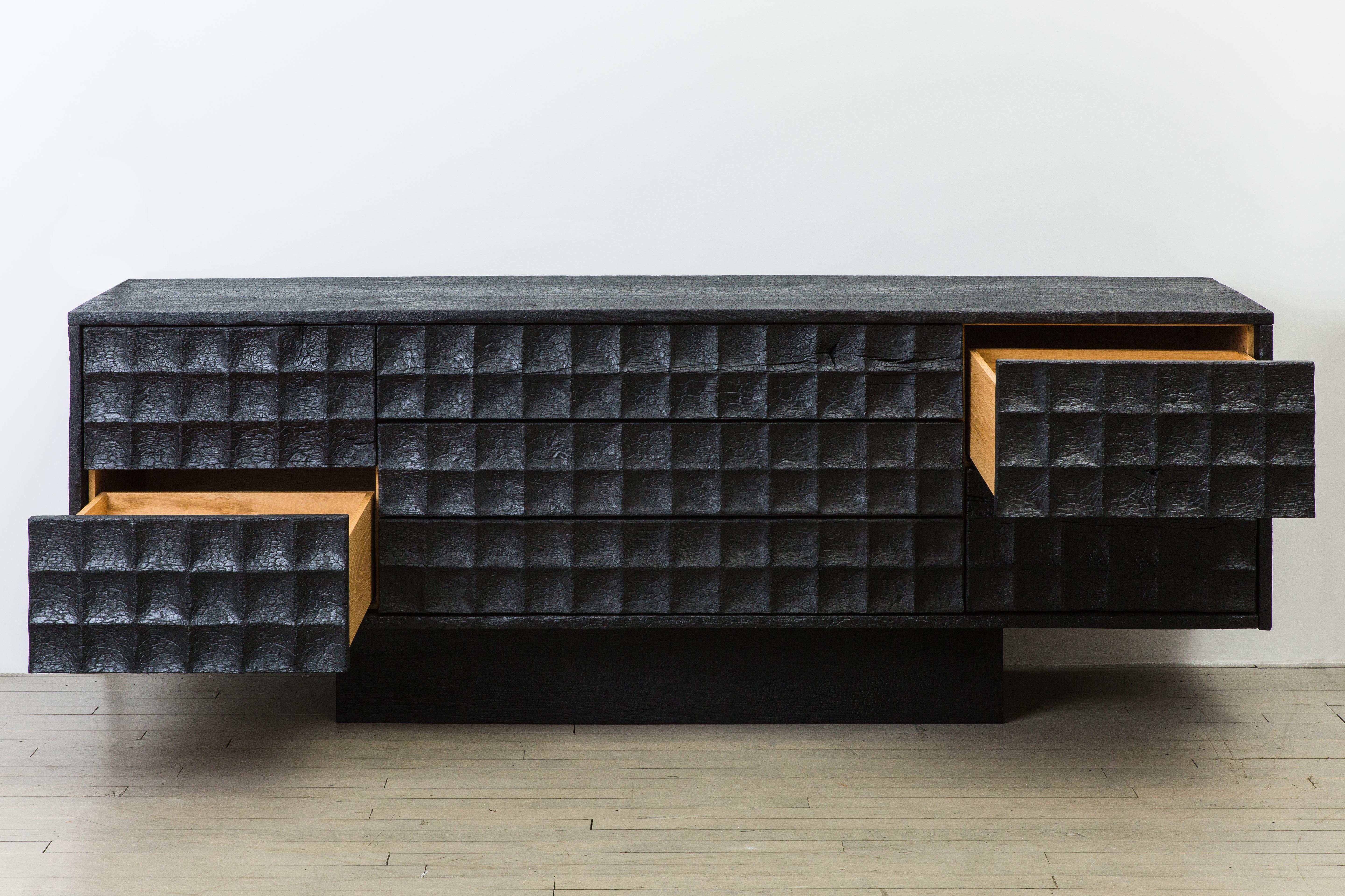 The Pure Black Console is the third piece in Yard Sale Project’s new Pure Black series. It is made from Oak, with Cedar of Lebanon drawer bottoms. The wood is finished using the shou-sugi-ban method, an ancient Japanese finishing technique that