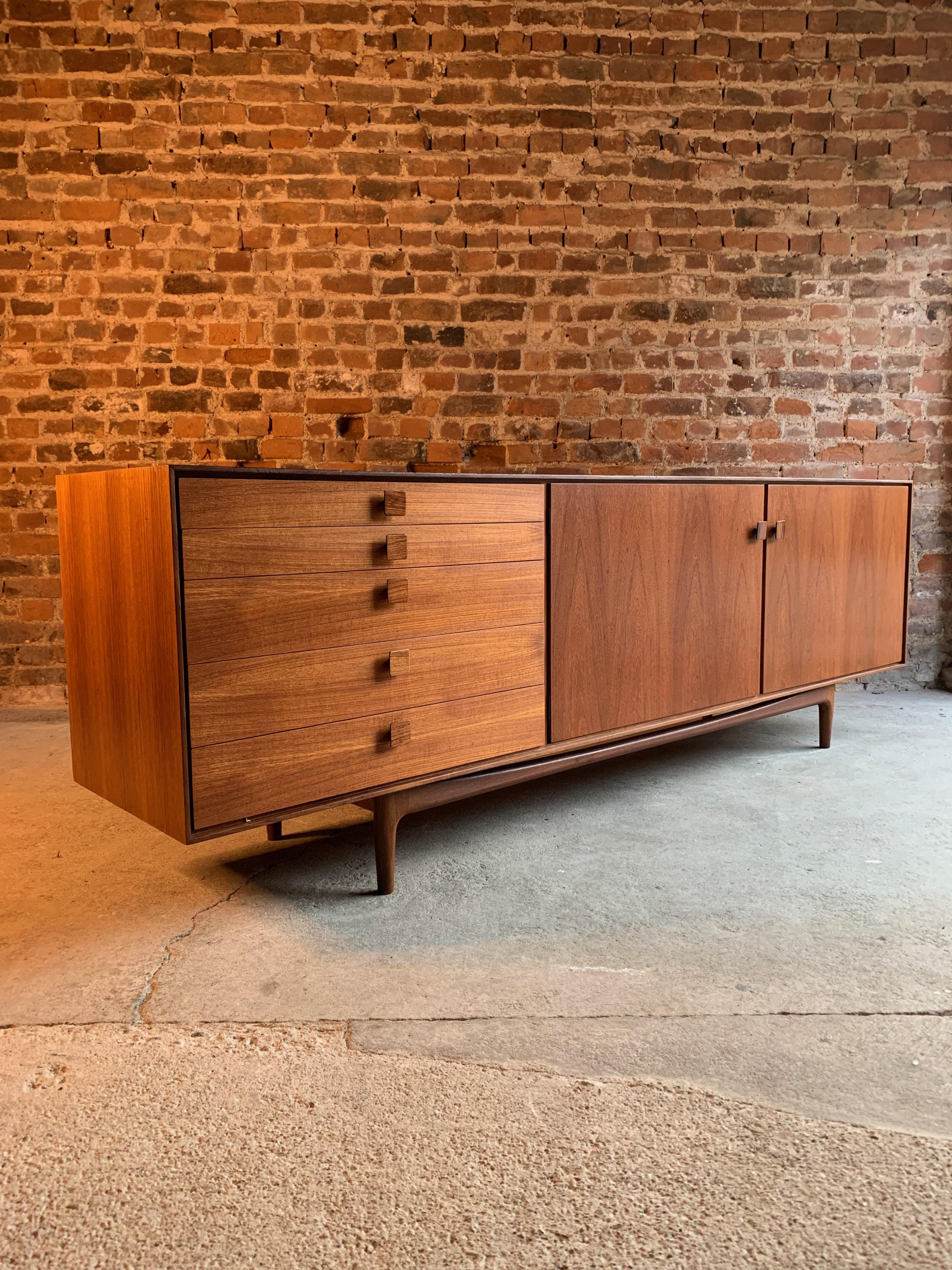 Ib Kofod-Larsen African teak sideboard manufactured in the UK for G-Plan in the 1960s

Magnificent midcentury Danish design sideboard credenza designed by Ib Kofod-Larsen, and manufactured by G-Plan circa 1960s, produced from African teak and