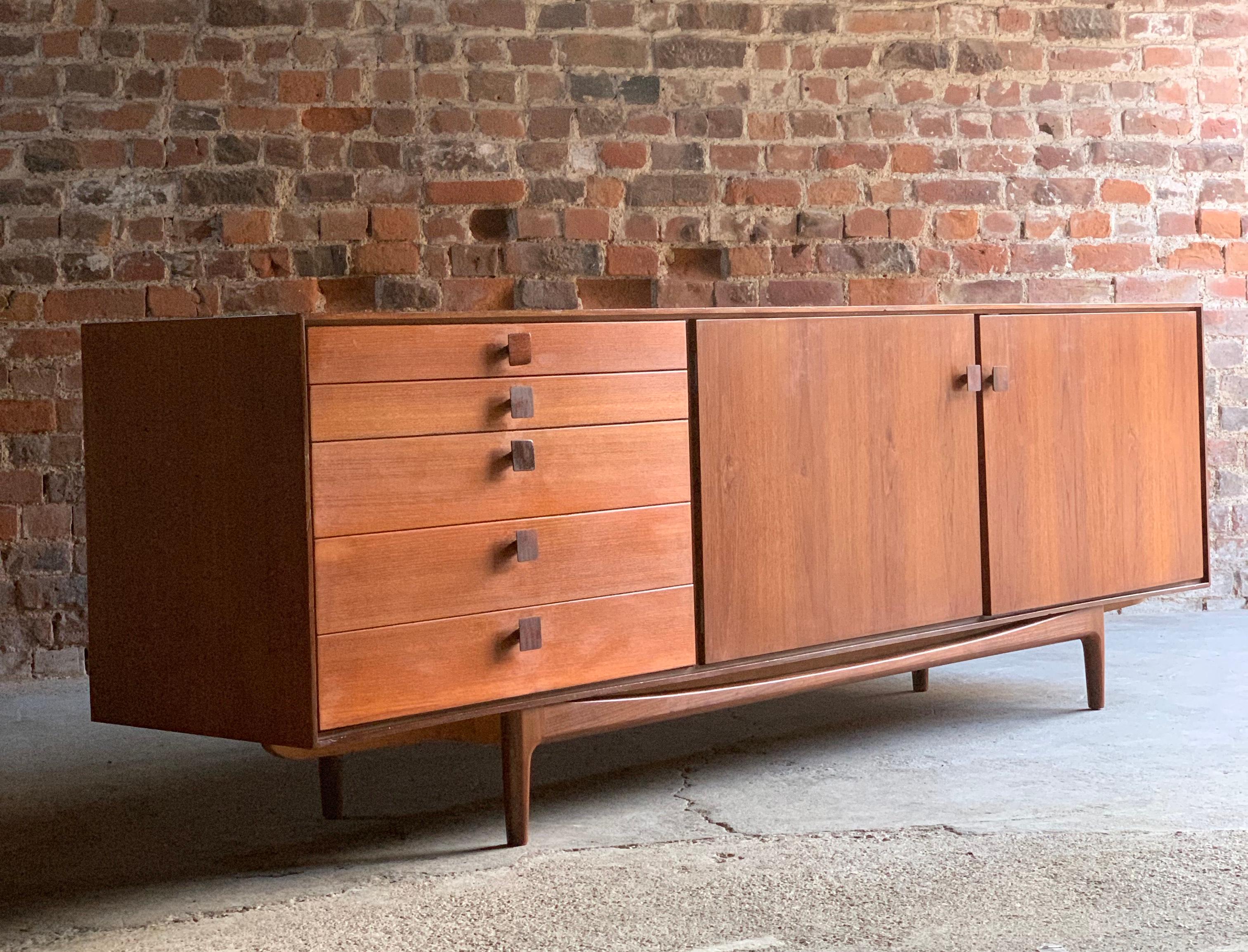 Ib Kofod-Larsen African teak sideboard manufactured in the UK for G-Plan in the 1960s

Magnificent midcentury Danish design sideboard credenza designed by Ib Kofod-Larsen, and manufactured by G-Plan, circa 1960s, produced from African teak and