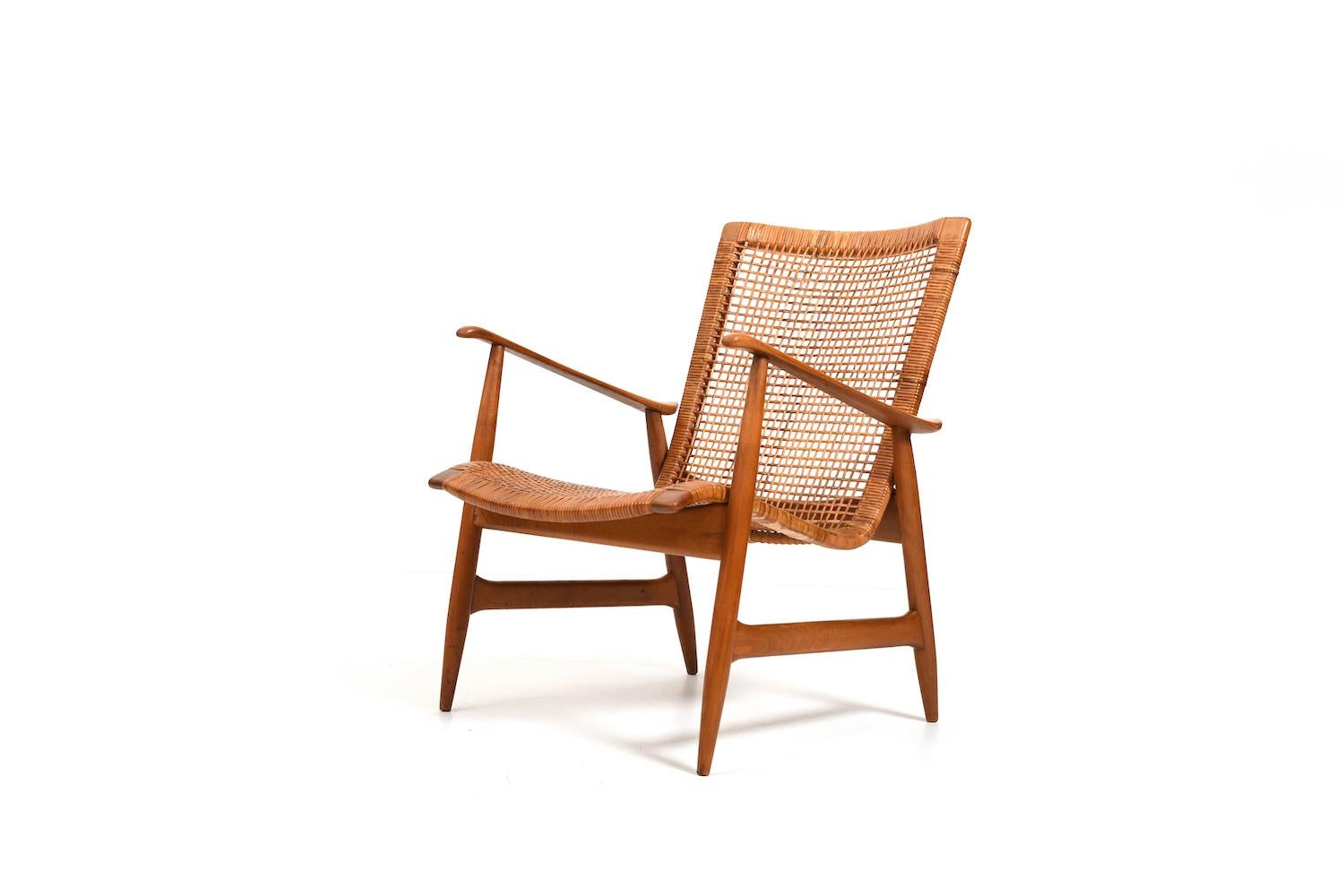 Danish Ib Kofod-Larsen attr. Easychair with Cane early 1950s. For Sale