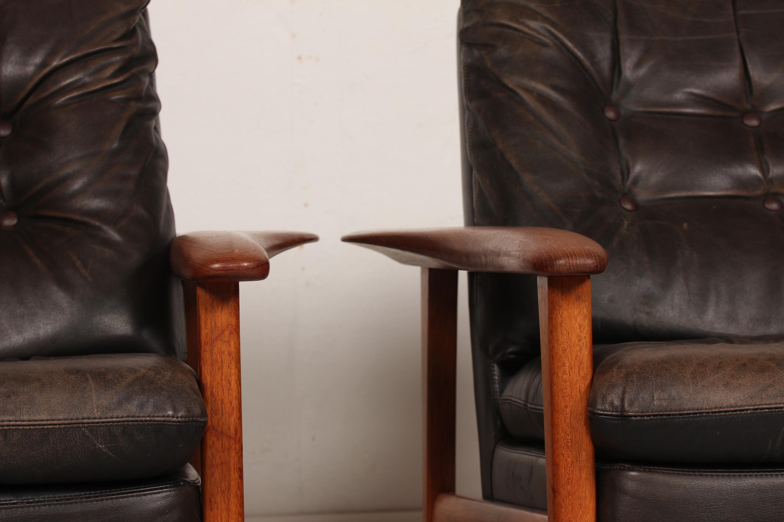 Late 20th Century Ib Kofod-Larsen Attributed Danish Modern Teak Lounge Chairs with Black Leather