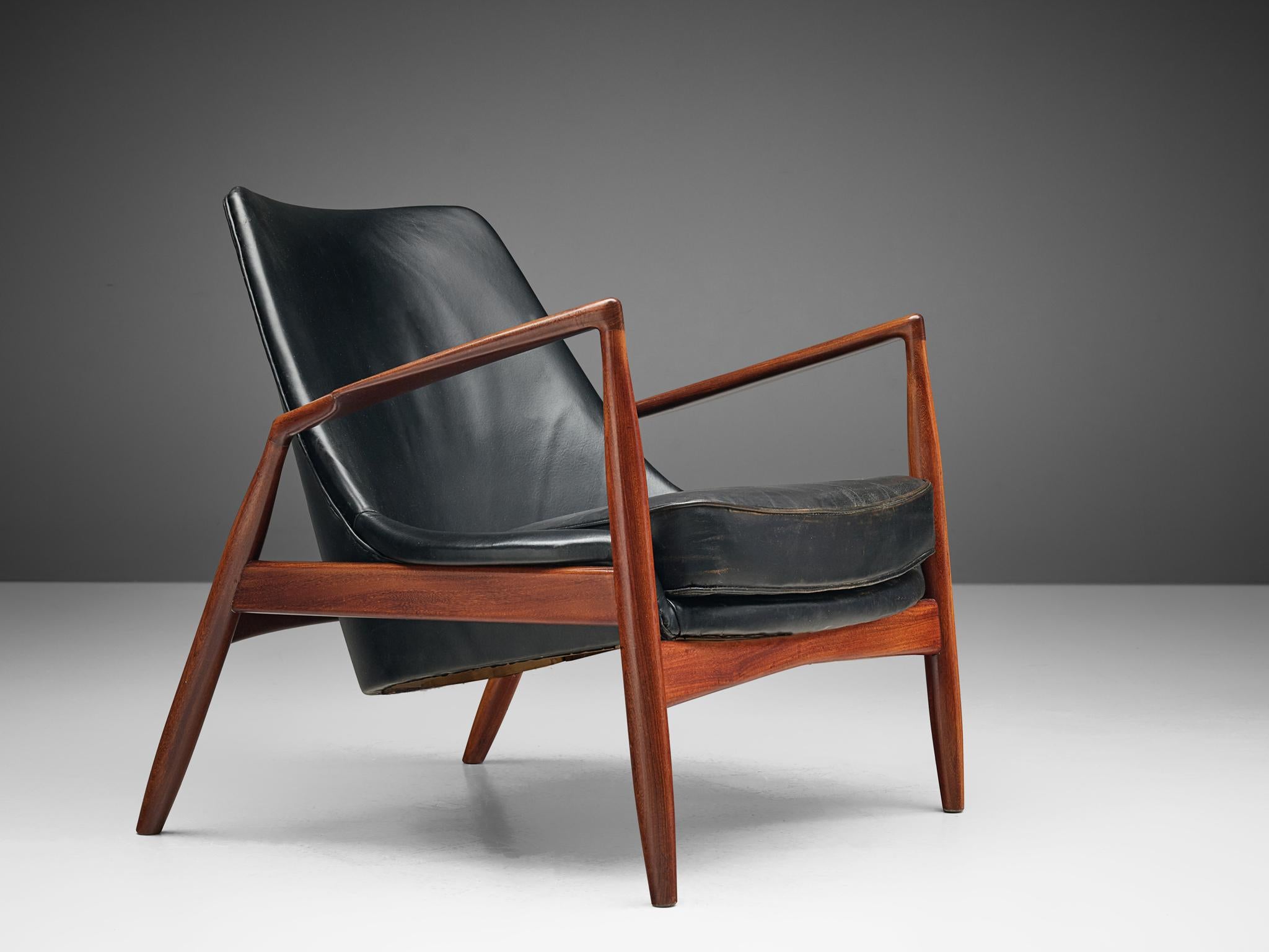 Ib Kofod-Larsen for OPE, restored 'Sälen' (Seal) lounge chair model 503-799, teak and leather, Sweden, 1956. 

Iconic seal lounge chair by Ib Kofod-Larsen, fully restored and reupholstered by the experienced craftsmen in our in-house atelier. The