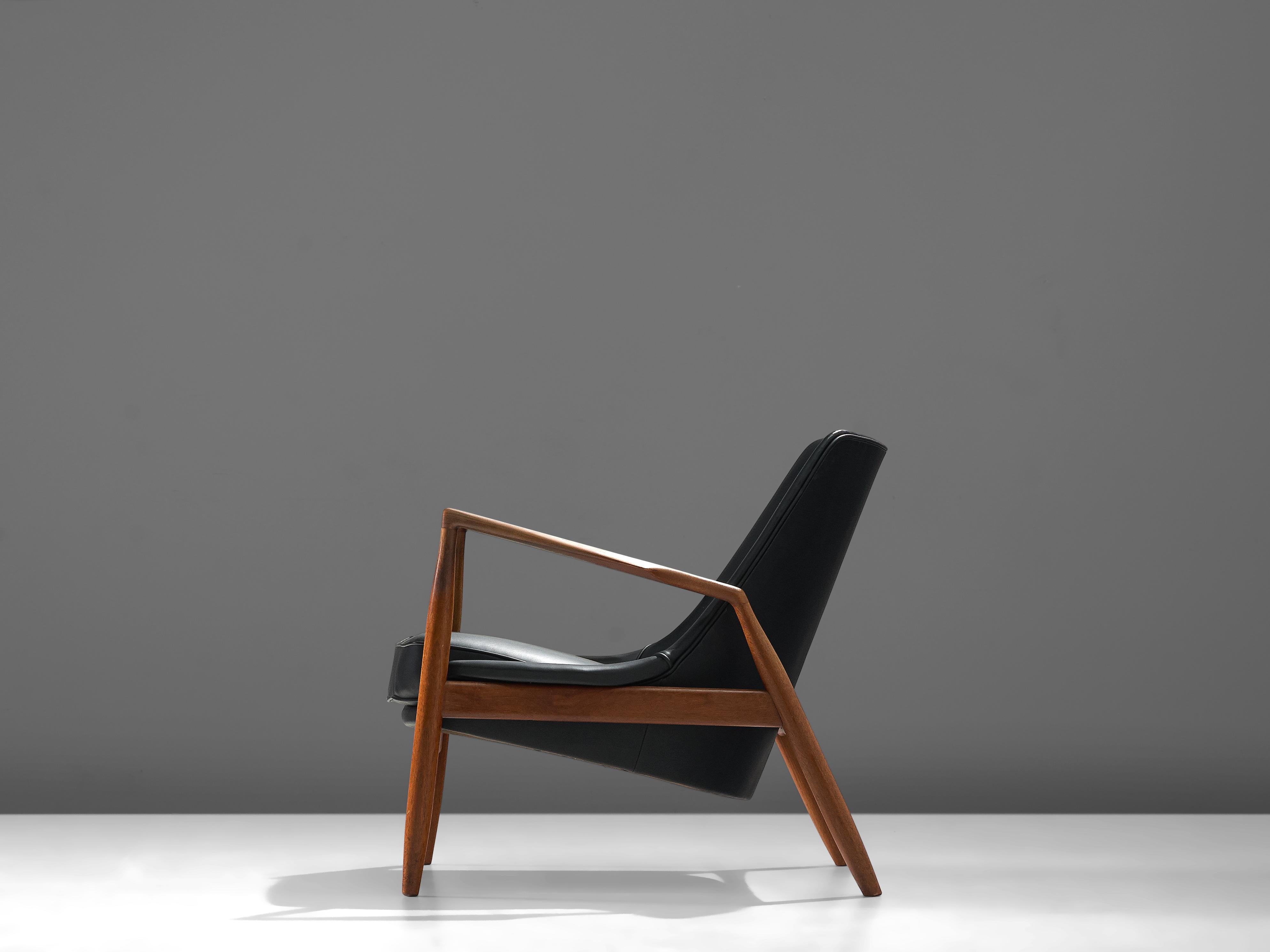 Scandinavian Modern Ib Kofod-Larsen Lounge Chair in Black Leather and Teak