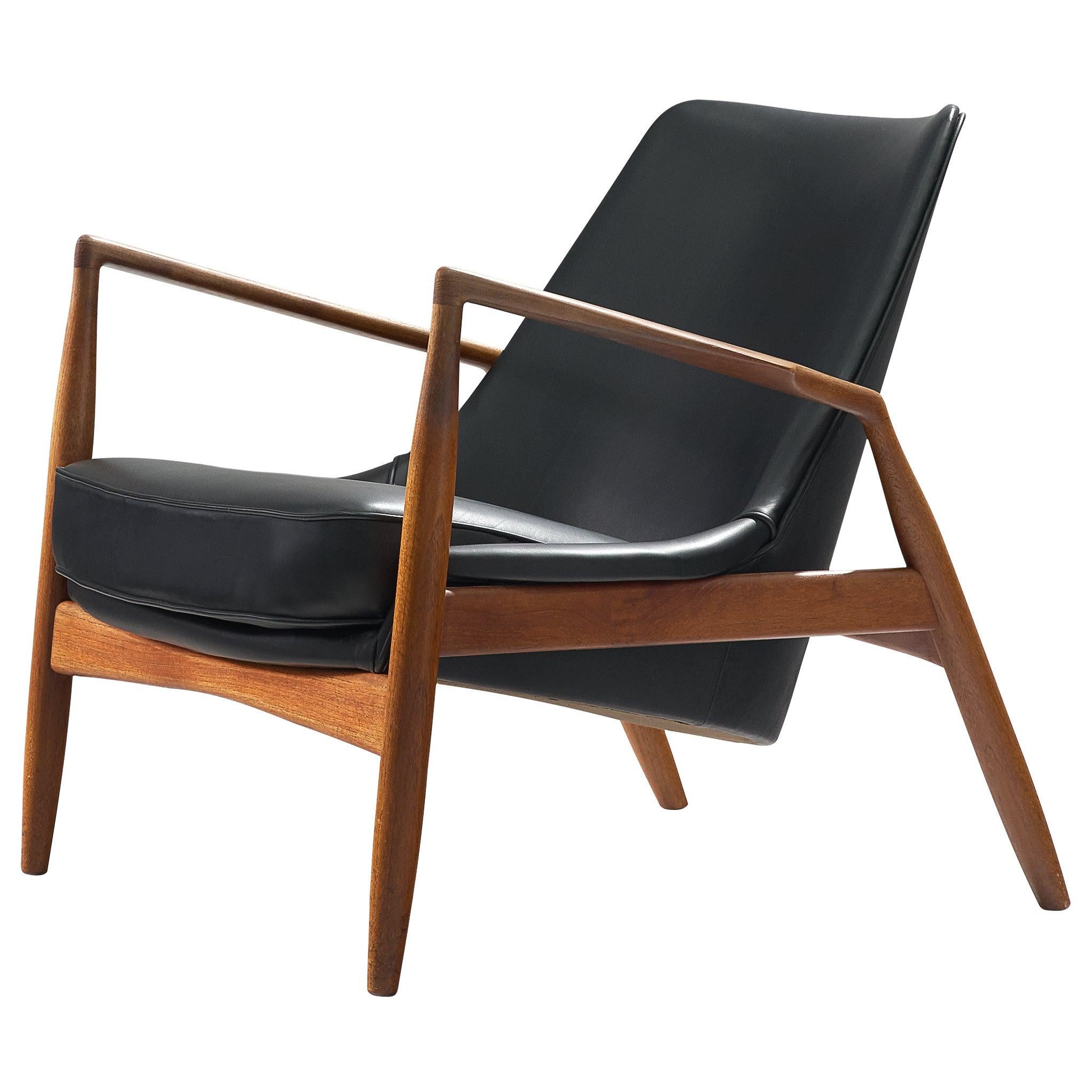 Ib Kofod-Larsen Lounge Chair in Black Leather and Teak